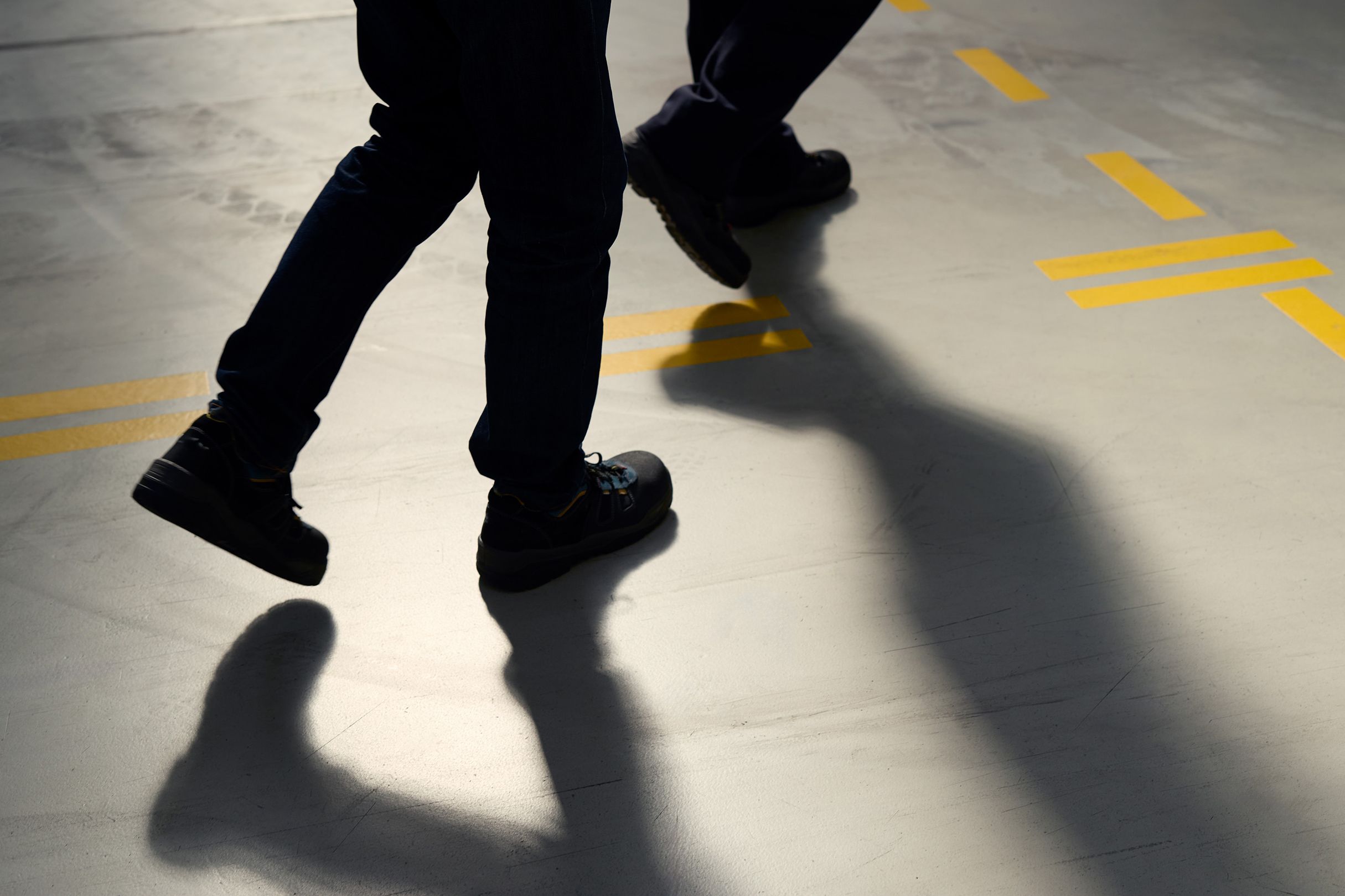 Abstract photo of two people walking