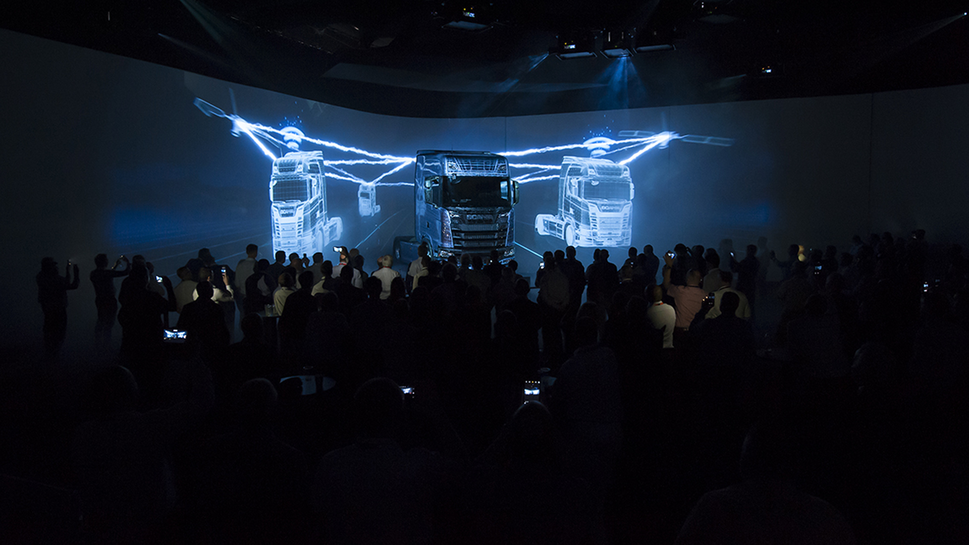 Crowd watching the Scania Next Generation launch event.