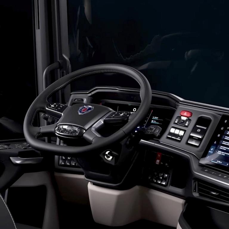 Interior view of a Scania truck showing the Smart Dash.