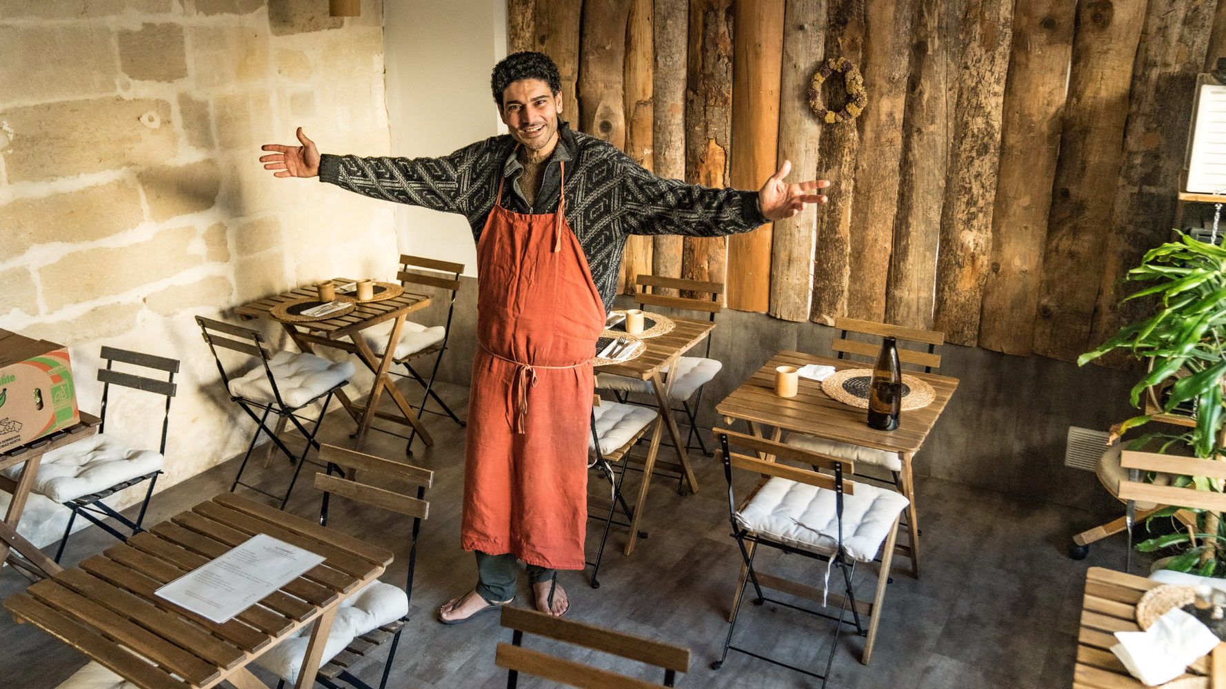 Saïd, le cofondateur, en tablier dans son restaurant