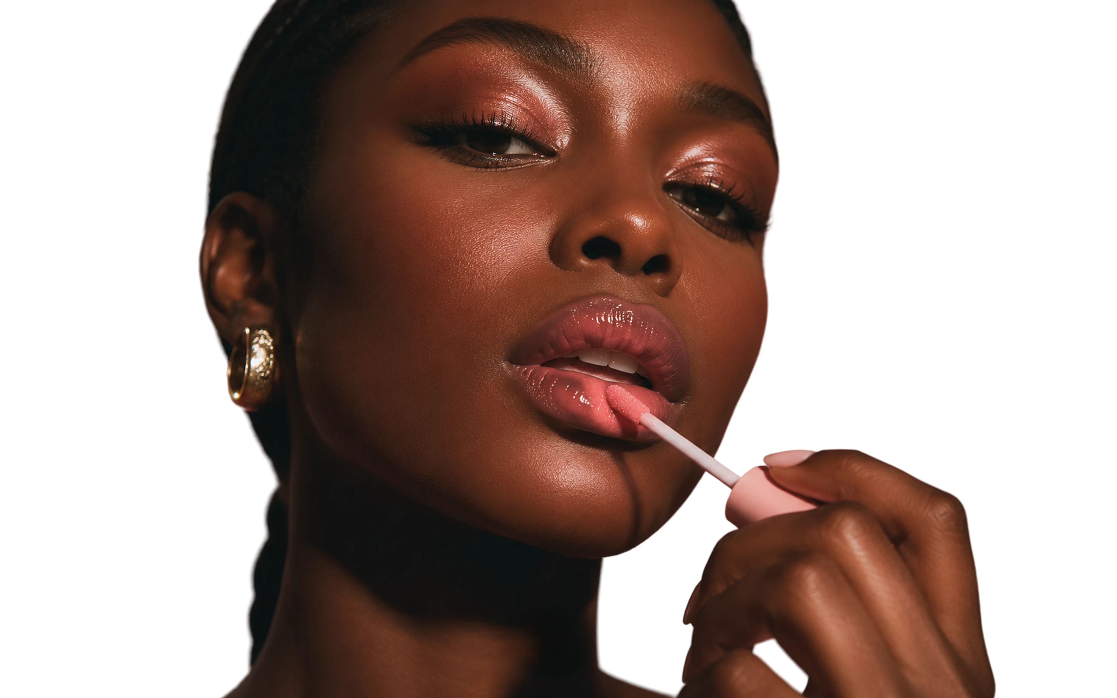 Model applying Shaby Wurld lip gloss