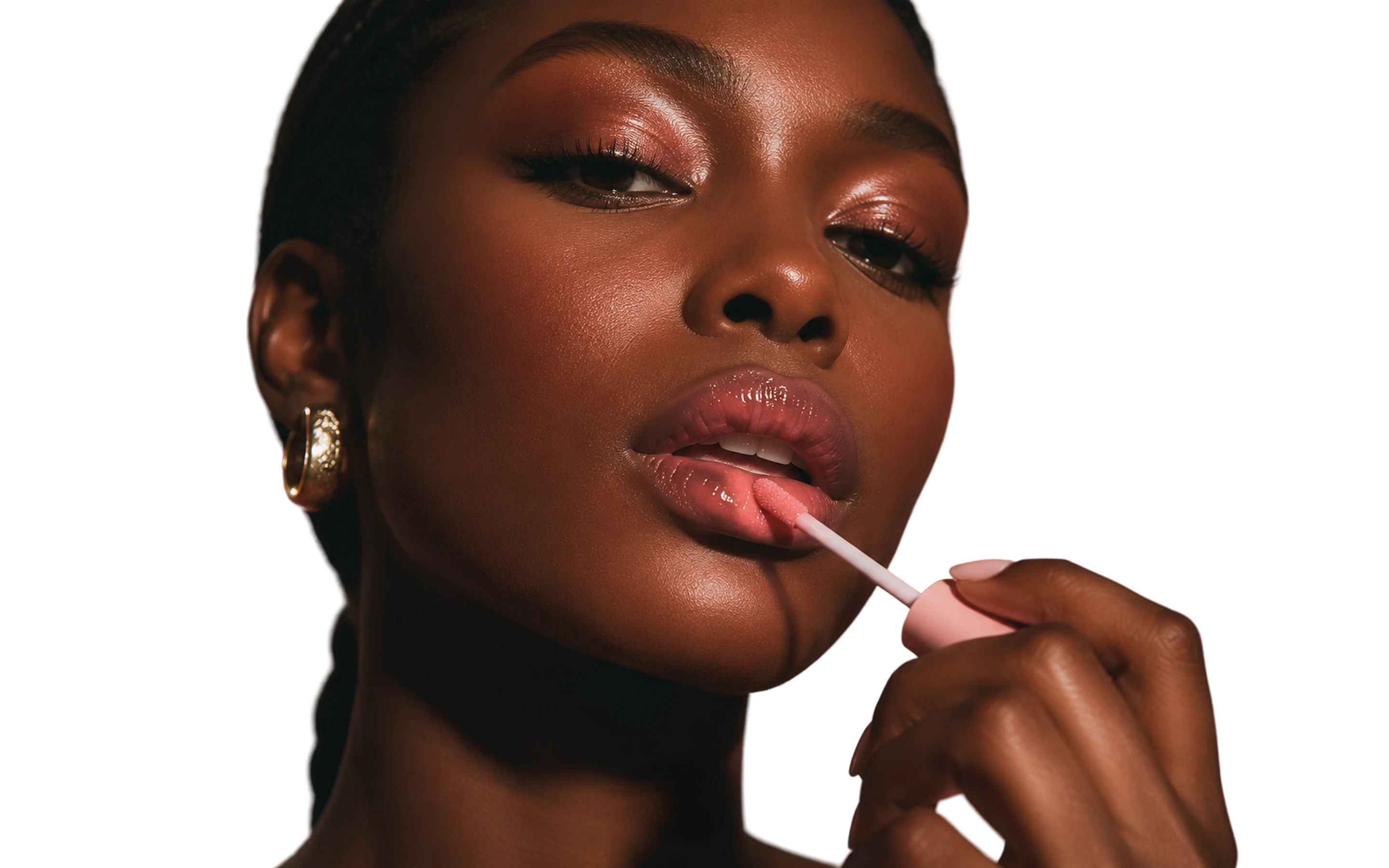Model applying Shaby Wurld lip gloss