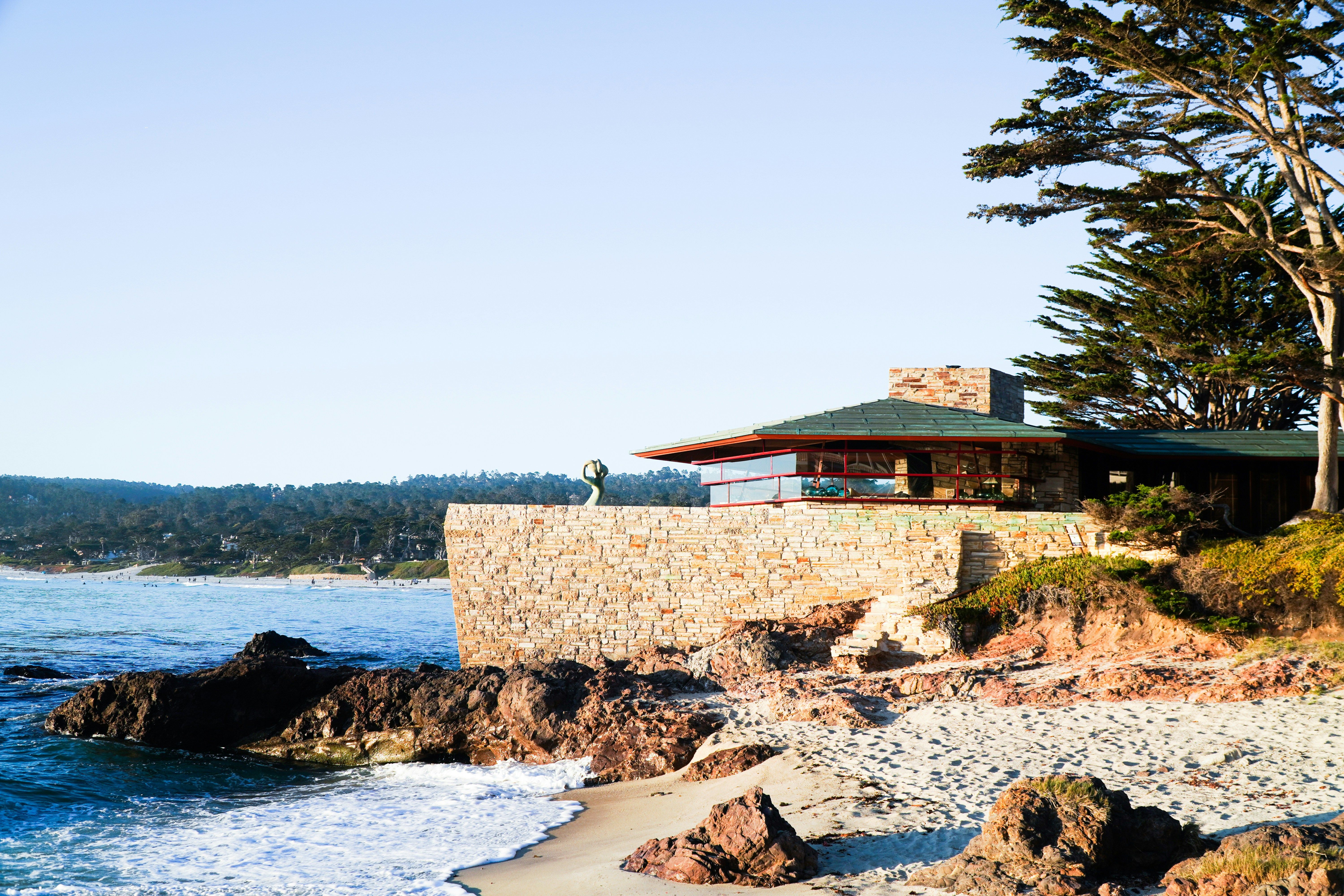 A stone house with a green roof stands on a rocky bluff overlooking a sandy beach and ocean.​​​​‌﻿‍﻿​‍​‍‌‍﻿﻿‌﻿​‍‌‍‍‌‌‍‌﻿‌‍‍‌‌‍﻿‍​‍​‍​﻿‍‍​‍​‍‌﻿​﻿‌‍​‌‌‍﻿‍‌‍‍‌‌﻿‌​‌﻿‍‌​‍﻿‍‌‍‍‌‌‍﻿﻿​‍​‍​‍﻿​​‍​‍‌‍‍​‌﻿​‍‌‍‌‌‌‍‌‍​‍​‍​﻿‍‍​‍​‍​‍﻿﻿‌﻿​﻿‌﻿‌​‌﻿‌‌‌‍‌​‌‍‍‌‌‍﻿﻿​‍﻿﻿‌‍‍‌‌‍﻿‍‌﻿‌​‌‍‌‌‌‍﻿‍‌﻿‌​​‍﻿﻿‌‍‌‌‌‍‌​‌‍‍‌‌﻿‌​​‍﻿﻿‌‍﻿‌‌‍﻿﻿‌‍‌​‌‍‌‌​﻿﻿‌‌﻿​​‌﻿​‍‌‍‌‌‌﻿​﻿‌‍‌‌‌‍﻿‍‌﻿‌​‌‍​‌‌﻿‌​‌‍‍‌‌‍﻿﻿‌‍﻿‍​﻿‍﻿‌‍‍‌‌‍‌​​﻿﻿‌‌‍​‌​﻿​﻿​﻿​‌​﻿‍​‌‍​﻿‌‍​‌​﻿‍​‌‍‌​​‍﻿‌​﻿‌‌​﻿‌﻿​﻿‍‌​﻿​​​‍﻿‌​﻿‌​​﻿‍​​﻿​‌​﻿‍‌​‍﻿‌​﻿‍​‌‍‌‌​﻿​﻿‌‍‌​​‍﻿‌​﻿‍‌​﻿​​​﻿‍‌‌‍‌​‌‍‌‌‌‍‌​‌‍‌​‌‍​‍​﻿‍​​﻿​‌​﻿​‍​﻿​‌​﻿‍﻿‌﻿‌​‌﻿‍‌‌﻿​​‌‍‌‌​﻿﻿‌‌﻿​​‌‍﻿﻿‌﻿​﻿‌﻿‌​​﻿‍﻿‌﻿​​‌‍​‌‌﻿‌​‌‍‍​​﻿﻿‌‌‍​﻿‌‍﻿﻿‌﻿‌‍‌‍‌‌‌﻿​‍‌​‍‌‌‍﻿‌‌‍​‌‌‍‌﻿‌‍‌‌​‍﻿‍‌‍​‌‌‍﻿​‌﻿‌​​﻿﻿﻿‌‍​‍‌‍​‌‌﻿​﻿‌‍‌‌‌‌‌‌‌﻿​‍‌‍﻿​​﻿﻿‌​‍‌‌​﻿​‍‌​‌‍‌﻿​﻿‌﻿‌​‌﻿‌‌‌‍‌​‌‍‍‌‌‍﻿﻿​‍‌‍‌‍‍‌‌‍‌​​﻿﻿‌‌‍​‌​﻿​﻿​﻿​‌​﻿‍​‌‍​﻿‌‍​‌​﻿‍​‌‍‌​​‍﻿‌​﻿‌‌​﻿‌﻿​﻿‍‌​﻿​​​‍﻿‌​﻿‌​​﻿‍​​﻿​‌​﻿‍‌​‍﻿‌​﻿‍​‌‍‌‌​﻿​﻿‌‍‌​​‍﻿‌​﻿‍‌​﻿​​​﻿‍‌‌‍‌​‌‍‌‌‌‍‌​‌‍‌​‌‍​‍​﻿‍​​﻿​‌​﻿​‍​﻿​‌​‍‌‍‌﻿‌​‌﻿‍‌‌﻿​​‌‍‌‌​﻿﻿‌‌﻿​​‌‍﻿﻿‌﻿​﻿‌﻿‌​​‍‌‍‌﻿​​‌‍​‌‌﻿‌​‌‍‍​​﻿﻿‌‌‍​﻿‌‍﻿﻿‌﻿‌‍‌‍‌‌‌﻿​‍‌​‍‌‌‍﻿‌‌‍​‌‌‍‌﻿‌‍‌‌​‍﻿‍‌‍​‌‌‍﻿​‌﻿‌​​‍‌‍‌﻿​​‌‍‌‌‌﻿​‍‌﻿​﻿‌﻿​​‌‍‌‌‌‍​﻿‌﻿‌​‌‍‍‌‌﻿‌‍‌‍‌‌​﻿﻿‌‌﻿​​‌﻿‌‌‌‍​‍‌‍﻿​‌‍‍‌‌﻿​﻿‌‍‍​‌‍‌‌‌‍‌​​‍​‍‌﻿﻿‌