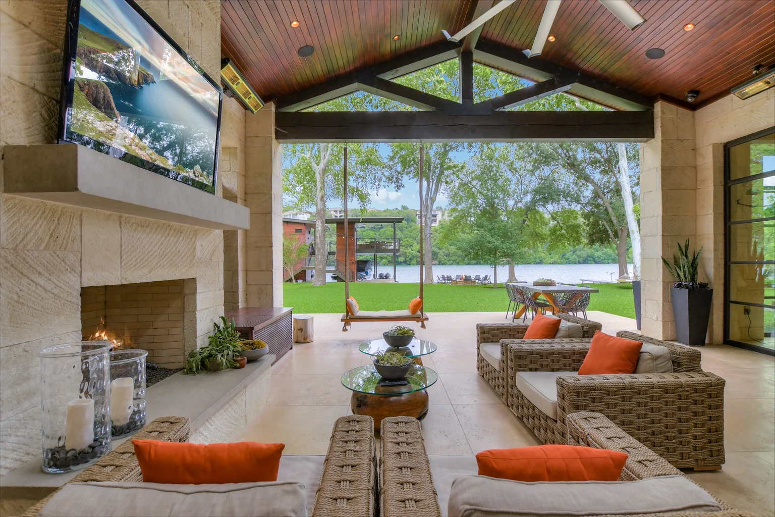 A covered outdoor living area with a fireplace, TV, and wicker furniture overlooking a lake and grassy lawn.​​​​‌﻿‍﻿​‍​‍‌‍﻿﻿‌﻿​‍‌‍‍‌‌‍‌﻿‌‍‍‌‌‍﻿‍​‍​‍​﻿‍‍​‍​‍‌﻿​﻿‌‍​‌‌‍﻿‍‌‍‍‌‌﻿‌​‌﻿‍‌​‍﻿‍‌‍‍‌‌‍﻿﻿​‍​‍​‍﻿​​‍​‍‌‍‍​‌﻿​‍‌‍‌‌‌‍‌‍​‍​‍​﻿‍‍​‍​‍​‍﻿﻿‌﻿​﻿‌﻿‌​‌﻿‌‌‌‍‌​‌‍‍‌‌‍﻿﻿​‍﻿﻿‌‍‍‌‌‍﻿‍‌﻿‌​‌‍‌‌‌‍﻿‍‌﻿‌​​‍﻿﻿‌‍‌‌‌‍‌​‌‍‍‌‌﻿‌​​‍﻿﻿‌‍﻿‌‌‍﻿﻿‌‍‌​‌‍‌‌​﻿﻿‌‌﻿​​‌﻿​‍‌‍‌‌‌﻿​﻿‌‍‌‌‌‍﻿‍‌﻿‌​‌‍​‌‌﻿‌​‌‍‍‌‌‍﻿﻿‌‍﻿‍​﻿‍﻿‌‍‍‌‌‍‌​​﻿﻿‌‌‍‌‌​﻿‌﻿​﻿​‍​﻿‍​​﻿​‌​﻿‌﻿​﻿​‌​﻿‌﻿​‍﻿‌‌‍‌‍​﻿‌﻿​﻿‍​‌‍​‍​‍﻿‌​﻿‌​‌‍​﻿​﻿​﻿​﻿‍‌​‍﻿‌​﻿‍‌​﻿‍‌‌‍​‌​﻿‌﻿​‍﻿‌​﻿‍‌‌‍‌‌​﻿‌﻿​﻿‍‌​﻿‍​‌‍​‍‌‍​﻿‌‍‌​‌‍​‍​﻿‌﻿​﻿‌﻿​﻿‌​​﻿‍﻿‌﻿‌​‌﻿‍‌‌﻿​​‌‍‌‌​﻿﻿‌‌﻿​​‌‍﻿﻿‌﻿​﻿‌﻿‌​​﻿‍﻿‌﻿​​‌‍​‌‌﻿‌​‌‍‍​​﻿﻿‌‌‍​﻿‌‍﻿﻿‌﻿‌‍‌‍‌‌‌﻿​‍‌​‍‌‌‍﻿‌‌‍​‌‌‍‌﻿‌‍‌‌​‍﻿‍‌‍​‌‌‍﻿​‌﻿‌​​﻿﻿﻿‌‍​‍‌‍​‌‌﻿​﻿‌‍‌‌‌‌‌‌‌﻿​‍‌‍﻿​​﻿﻿‌​‍‌‌​﻿​‍‌​‌‍‌﻿​﻿‌﻿‌​‌﻿‌‌‌‍‌​‌‍‍‌‌‍﻿﻿​‍‌‍‌‍‍‌‌‍‌​​﻿﻿‌‌‍‌‌​﻿‌﻿​﻿​‍​﻿‍​​﻿​‌​﻿‌﻿​﻿​‌​﻿‌﻿​‍﻿‌‌‍‌‍​﻿‌﻿​﻿‍​‌‍​‍​‍﻿‌​﻿‌​‌‍​﻿​﻿​﻿​﻿‍‌​‍﻿‌​﻿‍‌​﻿‍‌‌‍​‌​﻿‌﻿​‍﻿‌​﻿‍‌‌‍‌‌​﻿‌﻿​﻿‍‌​﻿‍​‌‍​‍‌‍​﻿‌‍‌​‌‍​‍​﻿‌﻿​﻿‌﻿​﻿‌​​‍‌‍‌﻿‌​‌﻿‍‌‌﻿​​‌‍‌‌​﻿﻿‌‌﻿​​‌‍﻿﻿‌﻿​﻿‌﻿‌​​‍‌‍‌﻿​​‌‍​‌‌﻿‌​‌‍‍​​﻿﻿‌‌‍​﻿‌‍﻿﻿‌﻿‌‍‌‍‌‌‌﻿​‍‌​‍‌‌‍﻿‌‌‍​‌‌‍‌﻿‌‍‌‌​‍﻿‍‌‍​‌‌‍﻿​‌﻿‌​​‍‌‍‌﻿​​‌‍‌‌‌﻿​‍‌﻿​﻿‌﻿​​‌‍‌‌‌‍​﻿‌﻿‌​‌‍‍‌‌﻿‌‍‌‍‌‌​﻿﻿‌‌﻿​​‌﻿‌‌‌‍​‍‌‍﻿​‌‍‍‌‌﻿​﻿‌‍‍​‌‍‌‌‌‍‌​​‍​‍‌﻿﻿‌