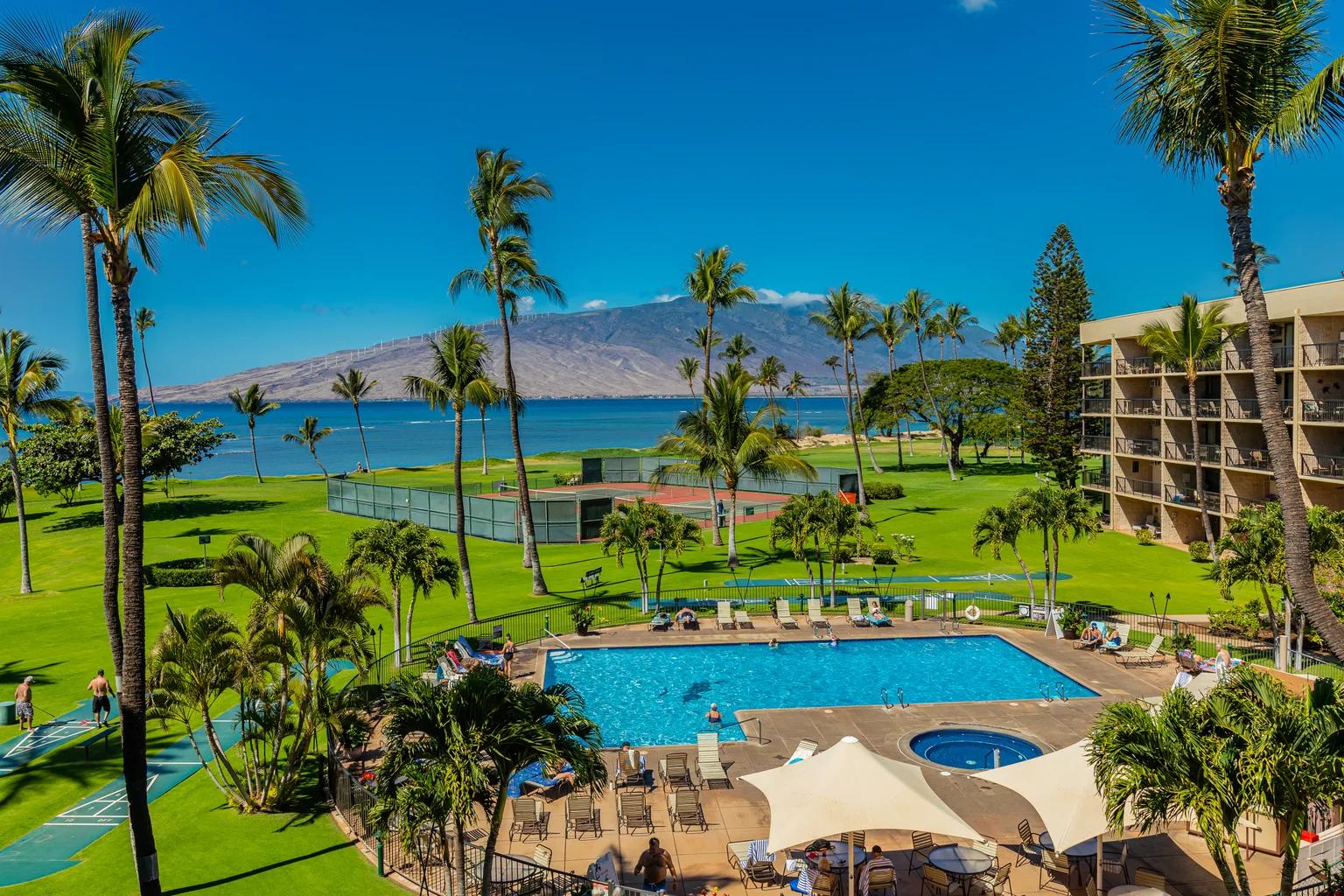 A tropical resort landscape with a swimming pool, hotel, palm trees, green lawns, tennis courts, ocean, and distant mountains under a clear blue sky.​​​​‌﻿‍﻿​‍​‍‌‍﻿﻿‌﻿​‍‌‍‍‌‌‍‌﻿‌‍‍‌‌‍﻿‍​‍​‍​﻿‍‍​‍​‍‌﻿​﻿‌‍​‌‌‍﻿‍‌‍‍‌‌﻿‌​‌﻿‍‌​‍﻿‍‌‍‍‌‌‍﻿﻿​‍​‍​‍﻿​​‍​‍‌‍‍​‌﻿​‍‌‍‌‌‌‍‌‍​‍​‍​﻿‍‍​‍​‍​‍﻿﻿‌﻿​﻿‌﻿‌​‌﻿‌‌‌‍‌​‌‍‍‌‌‍﻿﻿​‍﻿﻿‌‍‍‌‌‍﻿‍‌﻿‌​‌‍‌‌‌‍﻿‍‌﻿‌​​‍﻿﻿‌‍‌‌‌‍‌​‌‍‍‌‌﻿‌​​‍﻿﻿‌‍﻿‌‌‍﻿﻿‌‍‌​‌‍‌‌​﻿﻿‌‌﻿​​‌﻿​‍‌‍‌‌‌﻿​﻿‌‍‌‌‌‍﻿‍‌﻿‌​‌‍​‌‌﻿‌​‌‍‍‌‌‍﻿﻿‌‍﻿‍​﻿‍﻿‌‍‍‌‌‍‌​​﻿﻿‌​﻿​‍​﻿‌‍‌‍‌‍​﻿‌‍‌‍​‍‌‍​‍‌‍​‍‌‍​‍​‍﻿‌‌‍​﻿‌‍‌​‌‍​‍‌‍​‌​‍﻿‌​﻿‌​​﻿‍‌​﻿‍‌‌‍‌​​‍﻿‌‌‍​‌​﻿​​‌‍​﻿​﻿​​​‍﻿‌‌‍‌‍​﻿​‌​﻿​﻿‌‍​﻿​﻿‍‌‌‍​‍​﻿‍‌​﻿​​‌‍‌​‌‍​﻿​﻿​﻿​﻿​‌​﻿‍﻿‌﻿‌​‌﻿‍‌‌﻿​​‌‍‌‌​﻿﻿‌‌﻿​​‌‍﻿﻿‌﻿​﻿‌﻿‌​​﻿‍﻿‌﻿​​‌‍​‌‌﻿‌​‌‍‍​​﻿﻿‌‌‍​﻿‌‍﻿﻿‌﻿‌‍‌‍‌‌‌﻿​‍‌​‍‌‌‍﻿‌‌‍​‌‌‍‌﻿‌‍‌‌​‍﻿‍‌‍​‌‌‍﻿​‌﻿‌​​﻿﻿﻿‌‍​‍‌‍​‌‌﻿​﻿‌‍‌‌‌‌‌‌‌﻿​‍‌‍﻿​​﻿﻿‌​‍‌‌​﻿​‍‌​‌‍‌﻿​﻿‌﻿‌​‌﻿‌‌‌‍‌​‌‍‍‌‌‍﻿﻿​‍‌‍‌‍‍‌‌‍‌​​﻿﻿‌​﻿​‍​﻿‌‍‌‍‌‍​﻿‌‍‌‍​‍‌‍​‍‌‍​‍‌‍​‍​‍﻿‌‌‍​﻿‌‍‌​‌‍​‍‌‍​‌​‍﻿‌​﻿‌​​﻿‍‌​﻿‍‌‌‍‌​​‍﻿‌‌‍​‌​﻿​​‌‍​﻿​﻿​​​‍﻿‌‌‍‌‍​﻿​‌​﻿​﻿‌‍​﻿​﻿‍‌‌‍​‍​﻿‍‌​﻿​​‌‍‌​‌‍​﻿​﻿​﻿​﻿​‌​‍‌‍‌﻿‌​‌﻿‍‌‌﻿​​‌‍‌‌​﻿﻿‌‌﻿​​‌‍﻿﻿‌﻿​﻿‌﻿‌​​‍‌‍‌﻿​​‌‍​‌‌﻿‌​‌‍‍​​﻿﻿‌‌‍​﻿‌‍﻿﻿‌﻿‌‍‌‍‌‌‌﻿​‍‌​‍‌‌‍﻿‌‌‍​‌‌‍‌﻿‌‍‌‌​‍﻿‍‌‍​‌‌‍﻿​‌﻿‌​​‍‌‍‌﻿​​‌‍‌‌‌﻿​‍‌﻿​﻿‌﻿​​‌‍‌‌‌‍​﻿‌﻿‌​‌‍‍‌‌﻿‌‍‌‍‌‌​﻿﻿‌‌﻿​​‌﻿‌‌‌‍​‍‌‍﻿​‌‍‍‌‌﻿​﻿‌‍‍​‌‍‌‌‌‍‌​​‍​‍‌﻿﻿‌