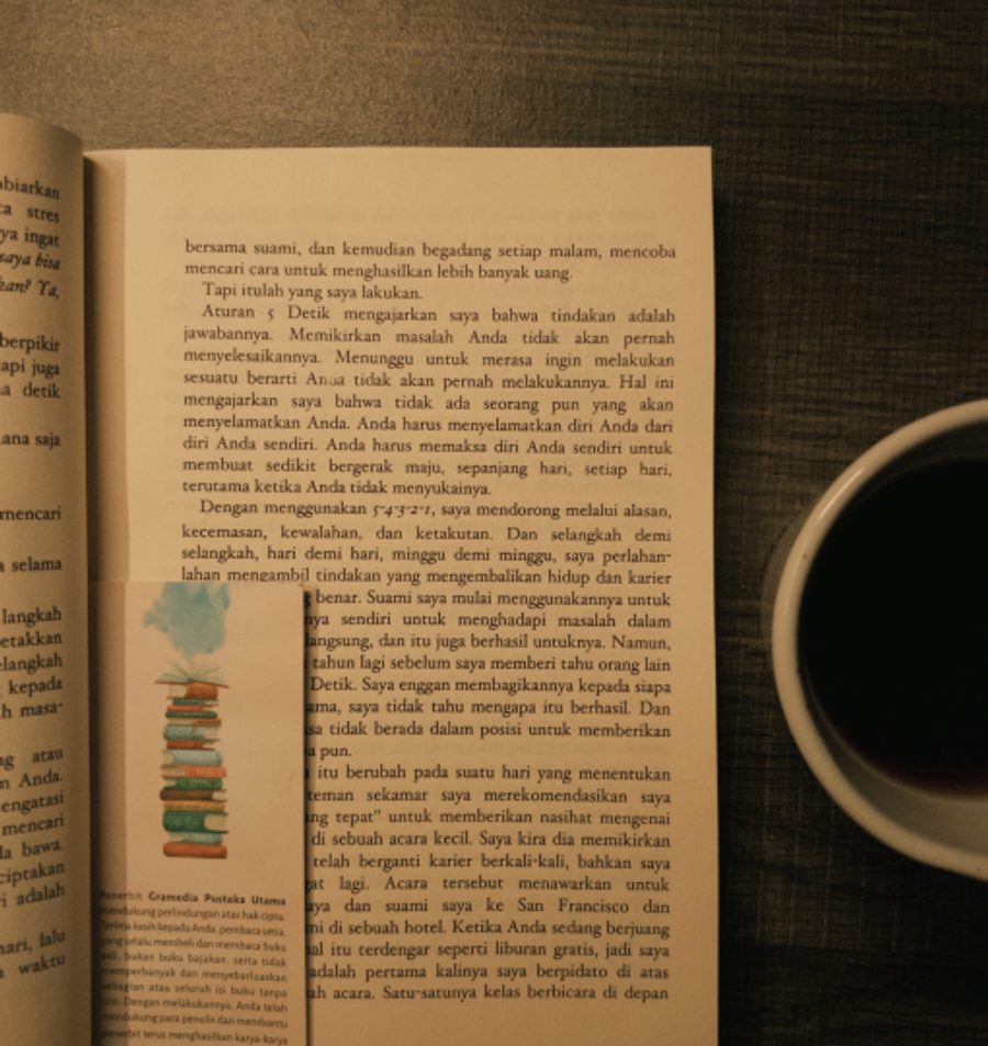 Reading with a cup of coffee