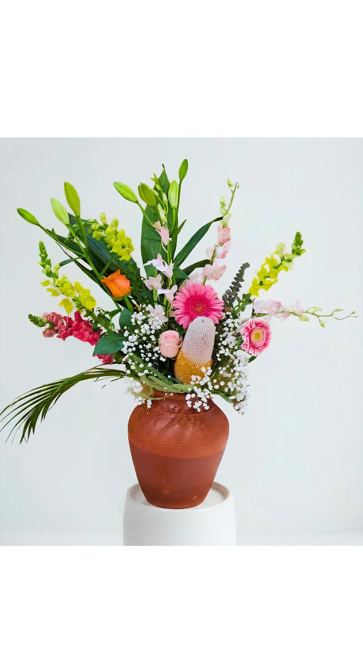 Beautiful flowers in an earthen pot