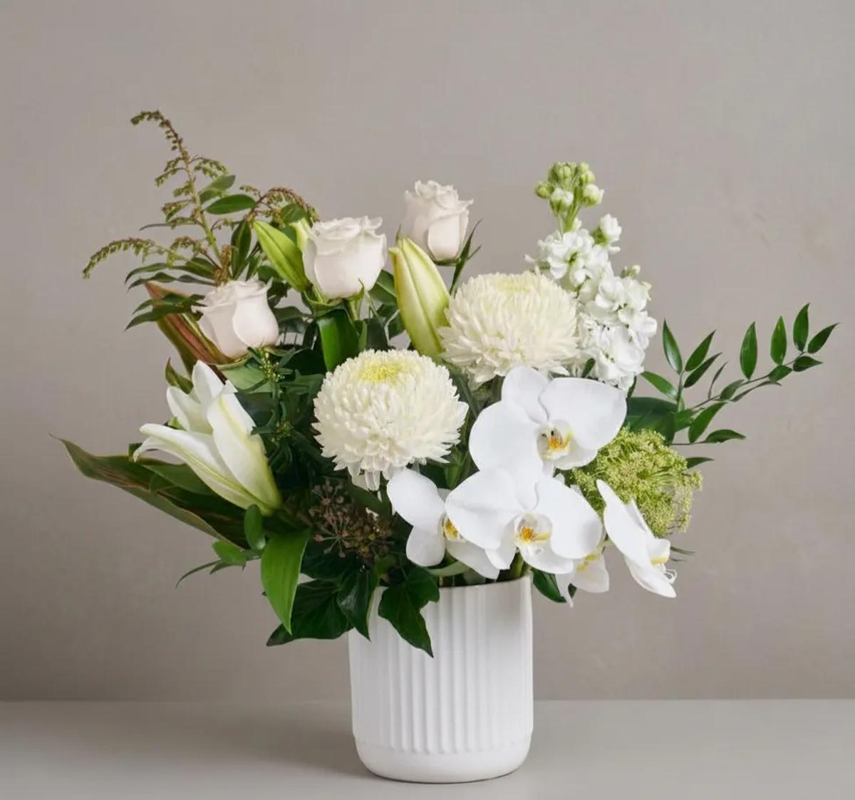 Soft peach and pink hand-tied bouquet
