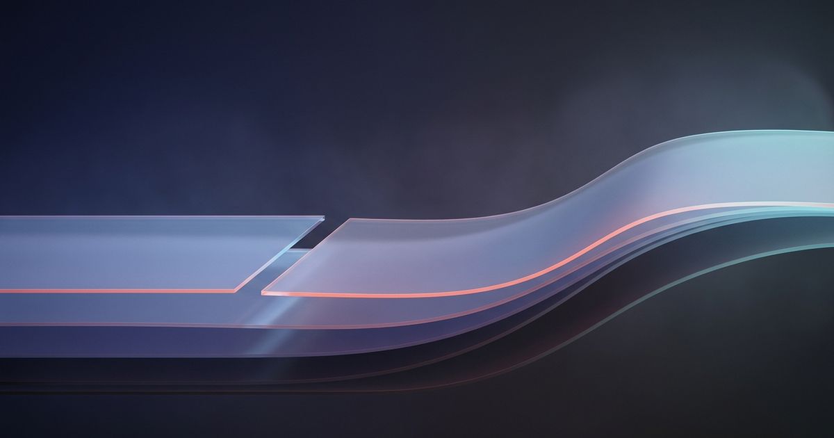 Translucent layered sheets with a broken edge joining into a continuous wave against a dark indigo background.