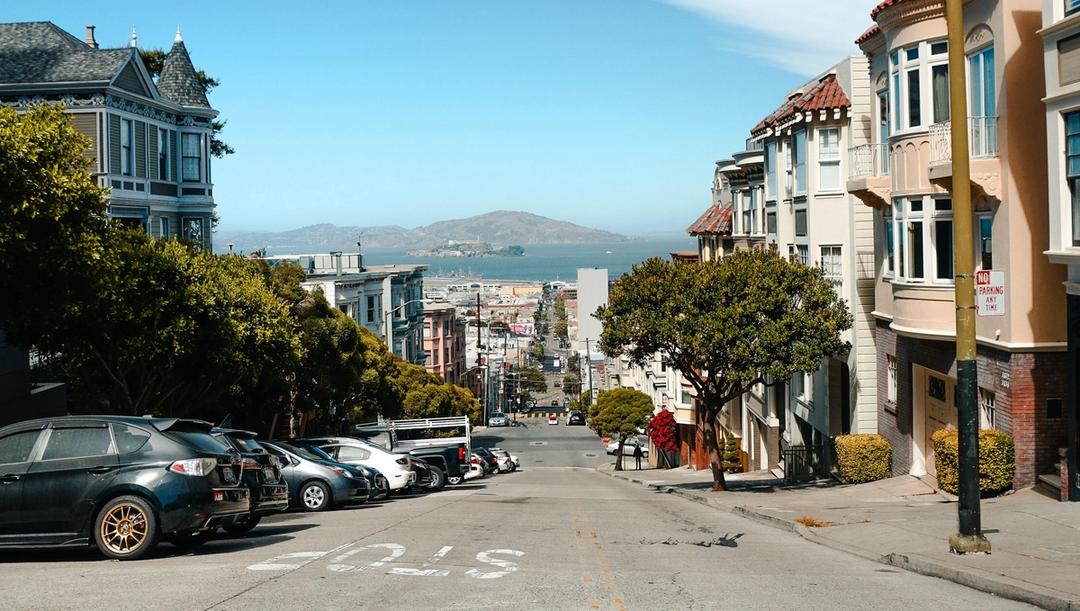Street view of San Francisco neighborhood with bay view.