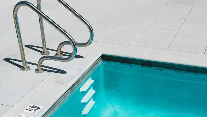 Blue swimming pool.