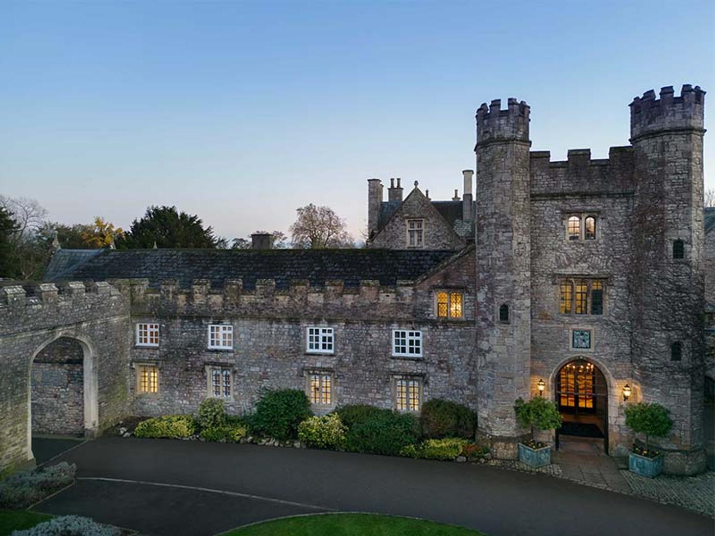 Delta Hotels St. Pierre Country Club manor house exterior at dusk