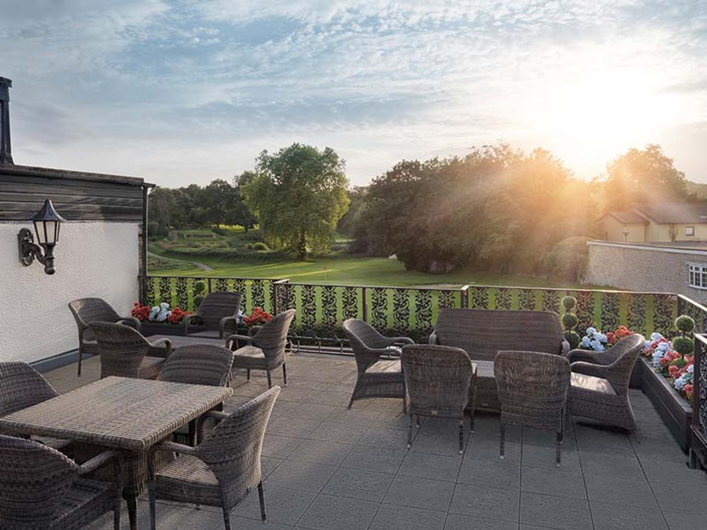 Chepstow balcony overlooking the golf course at sunset