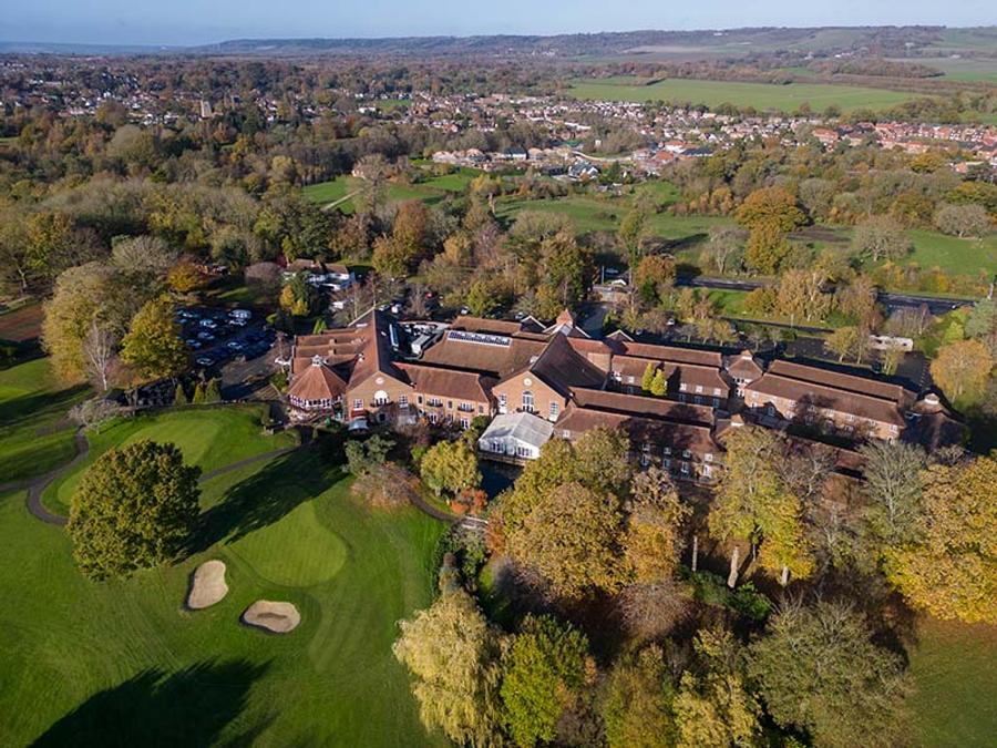 Aerial view of Delta Hotels by Marriott Tudor Park Country Club's clubhouse and golf course