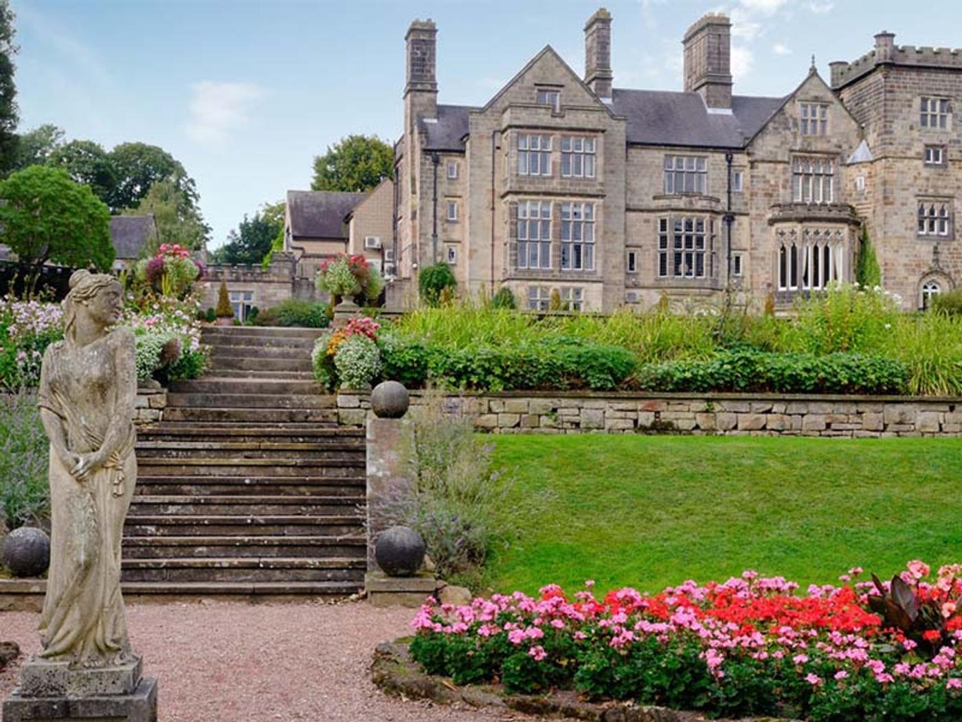 Statue and stone steps leading up to Delta Hotels Breadsall Priory Country Club's gardens