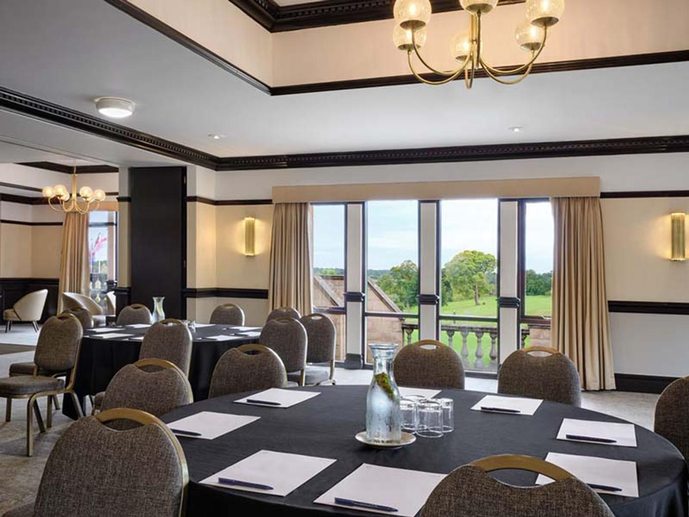 Boardroom-style meeting room with U-shaped table at Delta Hotels Breadsall Priory Country Club