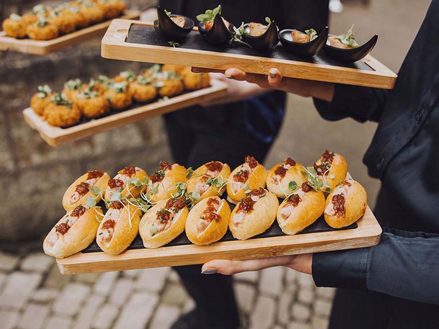 Canapés being served to wedding guests