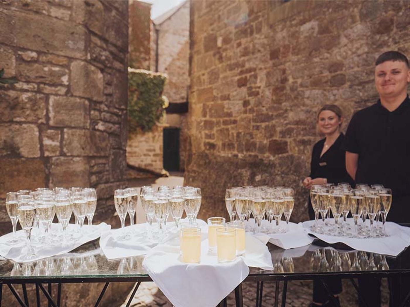 Champagne reception laid out in Delta Hotels St. Pierre Country Club's courtyard