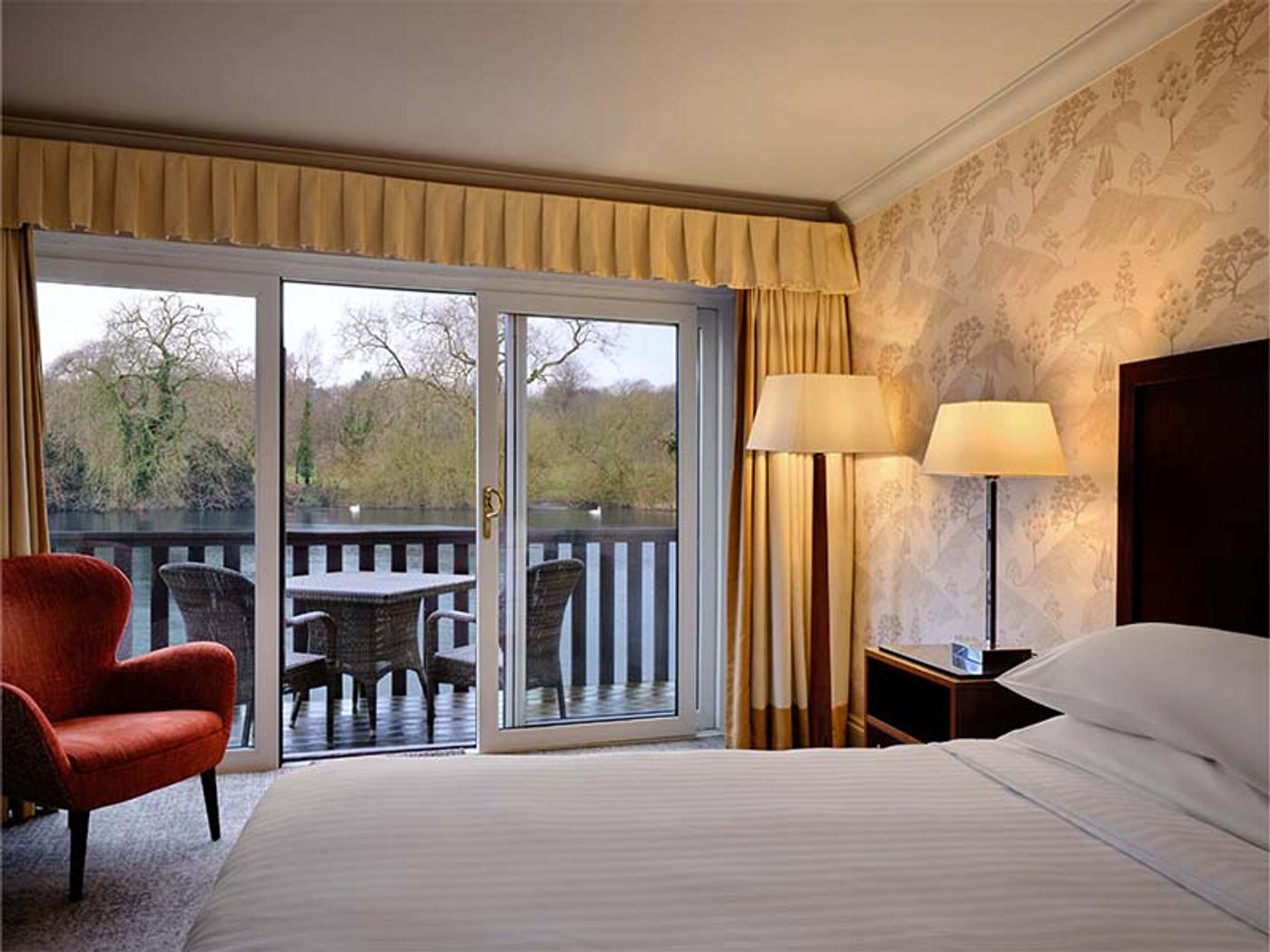 Bedroom overlooking the lake with private terrace