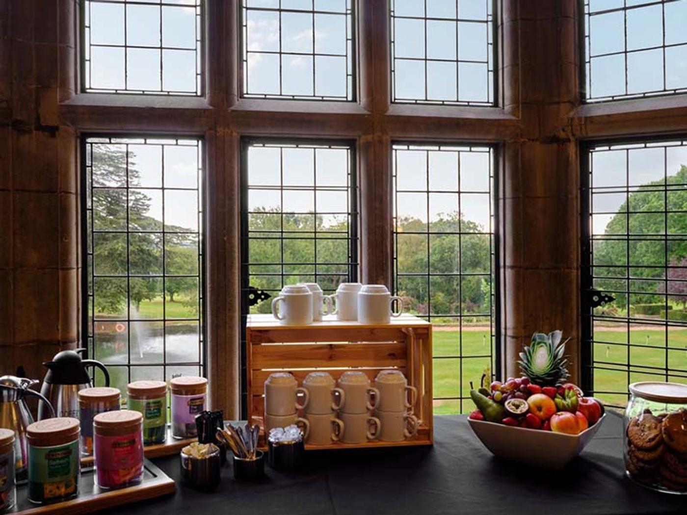 Refreshment station with tea, coffee and fruit overlooking the grounds at Delta Hotels Breadsall Priory Country Club