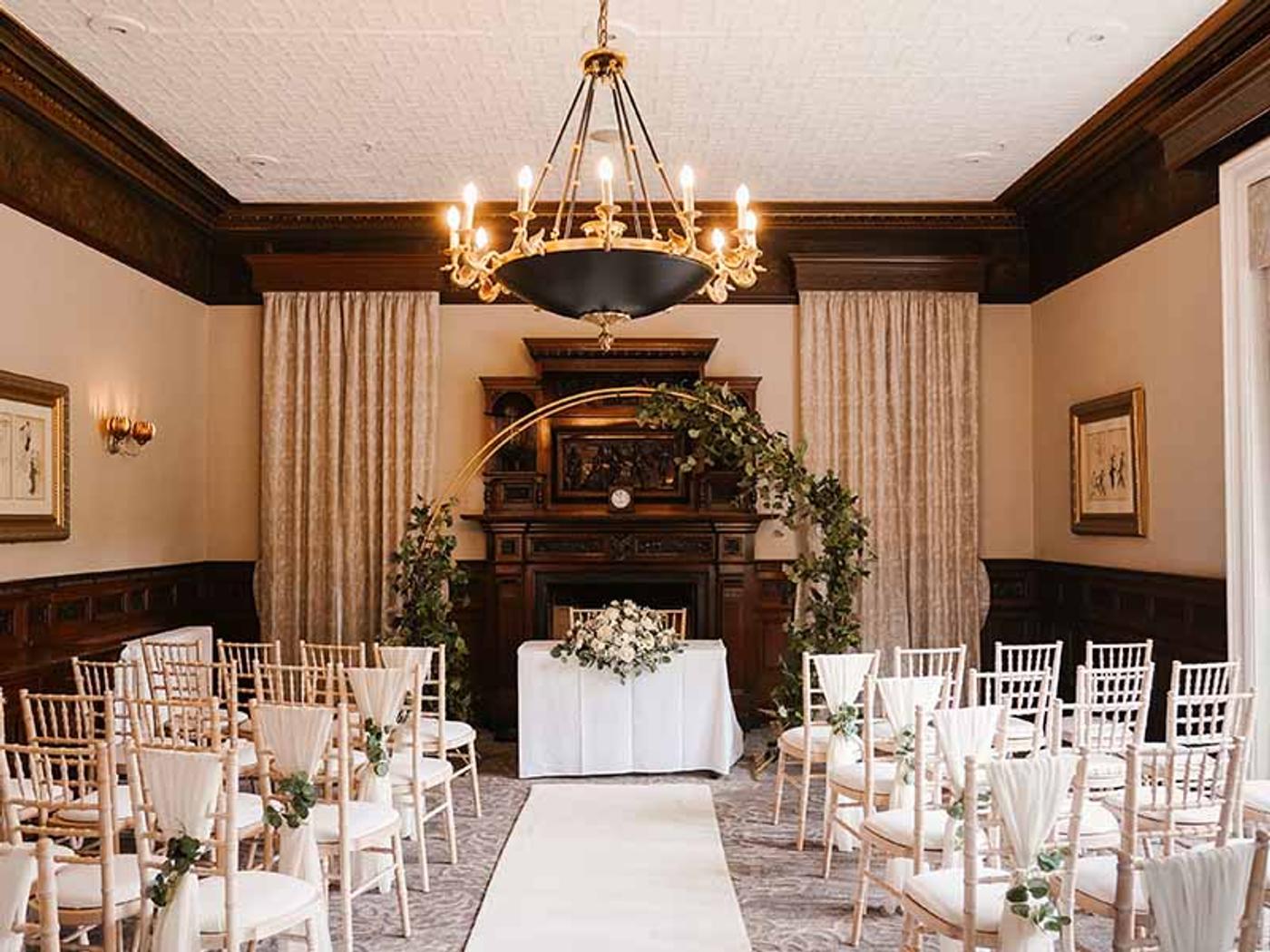 Breadsall Room set up for a ceremony in front of the fireplace
