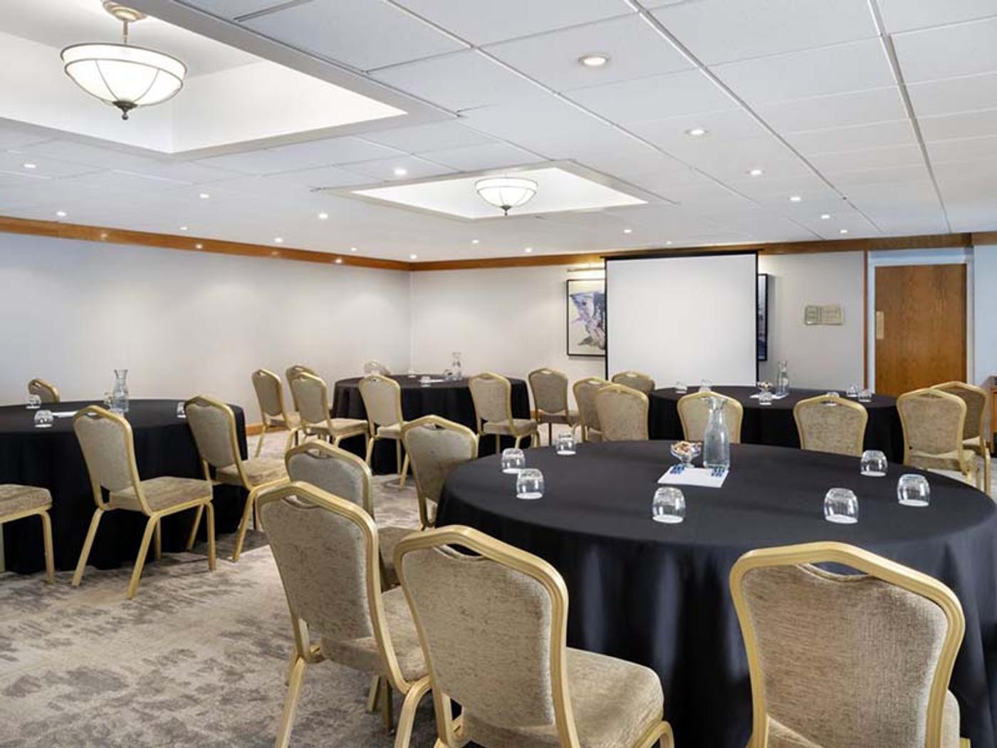 Bearsted Room set cabaret-style with round tables for a meeting