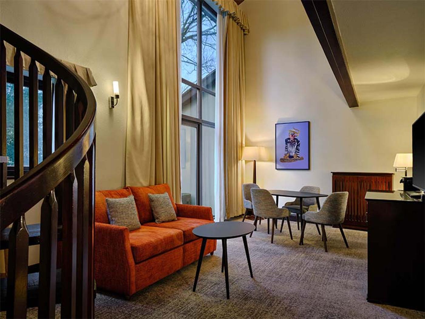 Bedroom with garden views through leaded windows