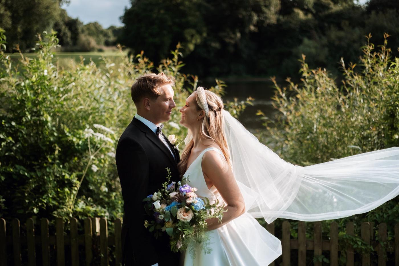 Bride and groom at lake
