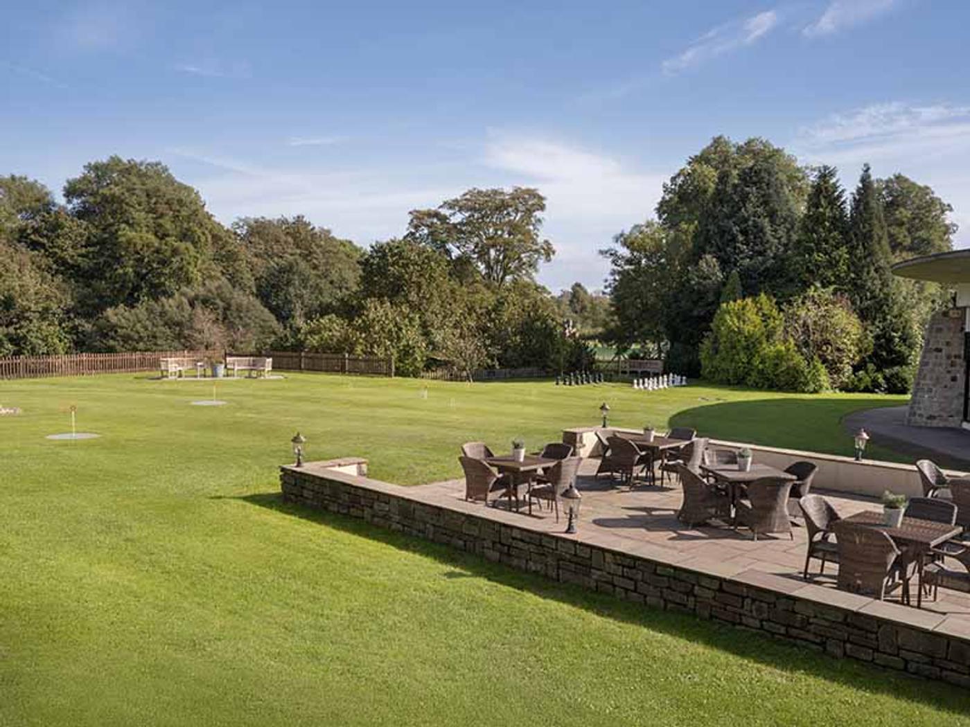 Outdoor putting green and lounge terrace at Delta Hotels St. Pierre Country Club