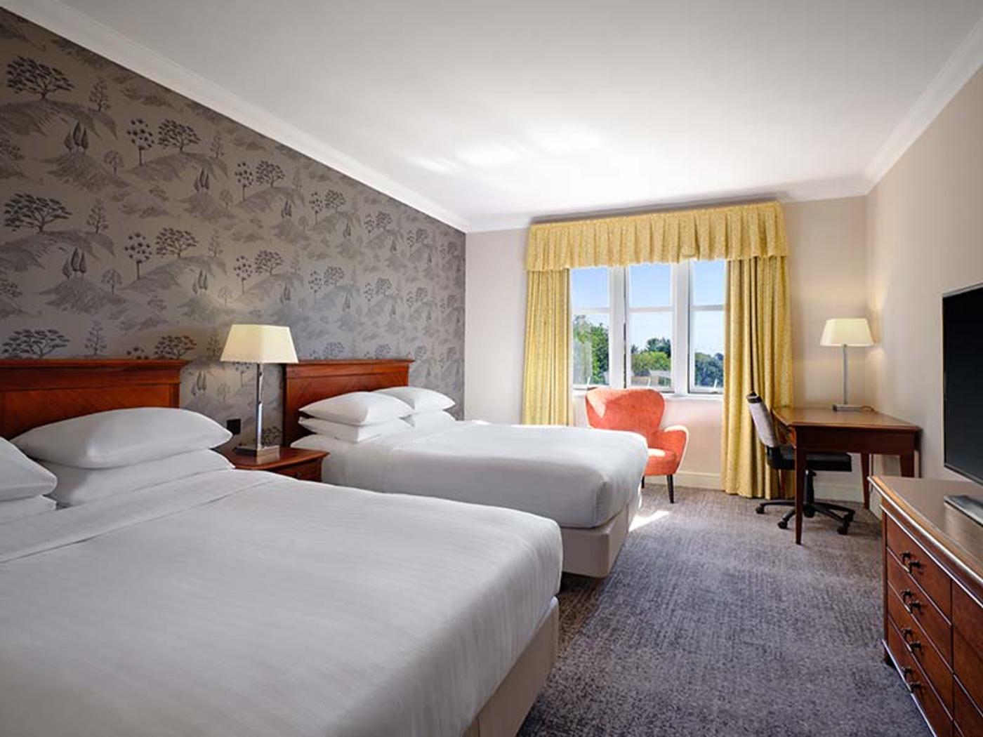 Bedroom with garden views at Delta Hotels Breadsall Priory Country Club
