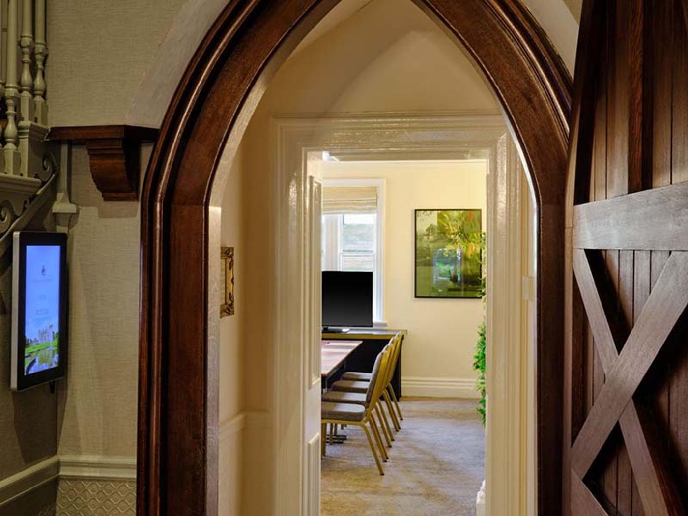 Gothic archway leading into a meeting room at Delta Hotels Breadsall Priory Country Club