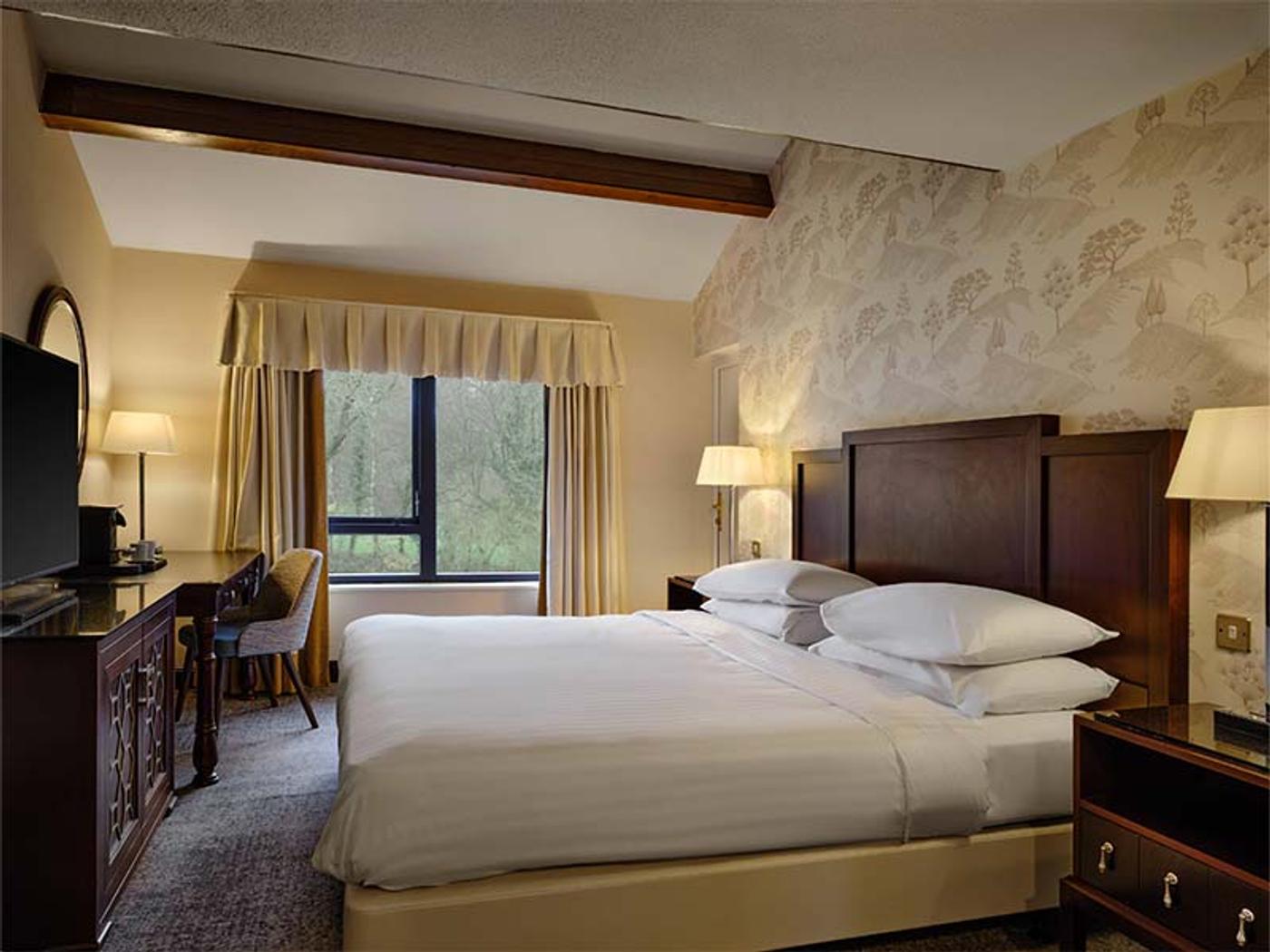 Bedroom with woodland views