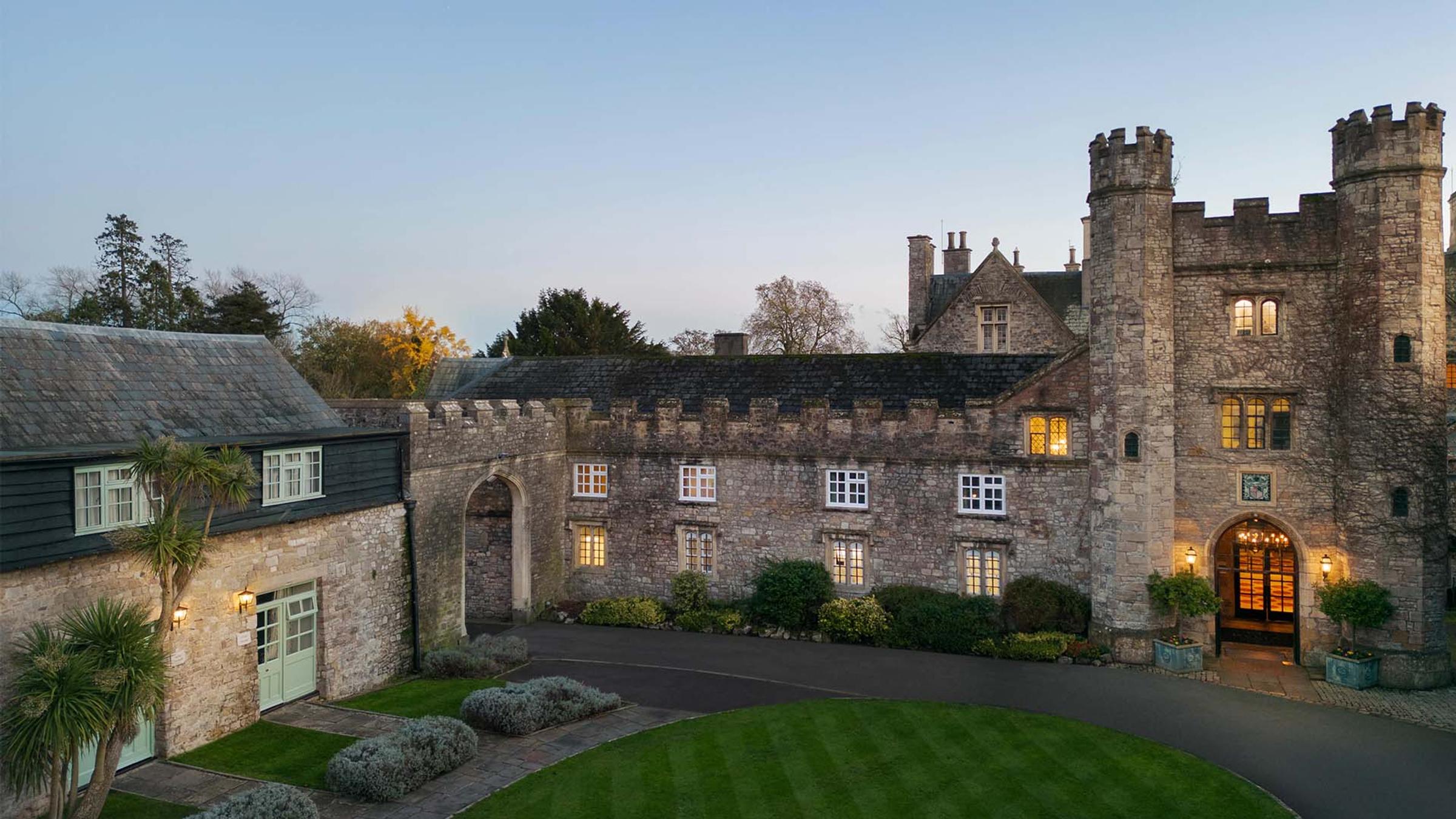 Delta Hotels St. Pierre Country Club gatehouse tower and courtyard at dusk