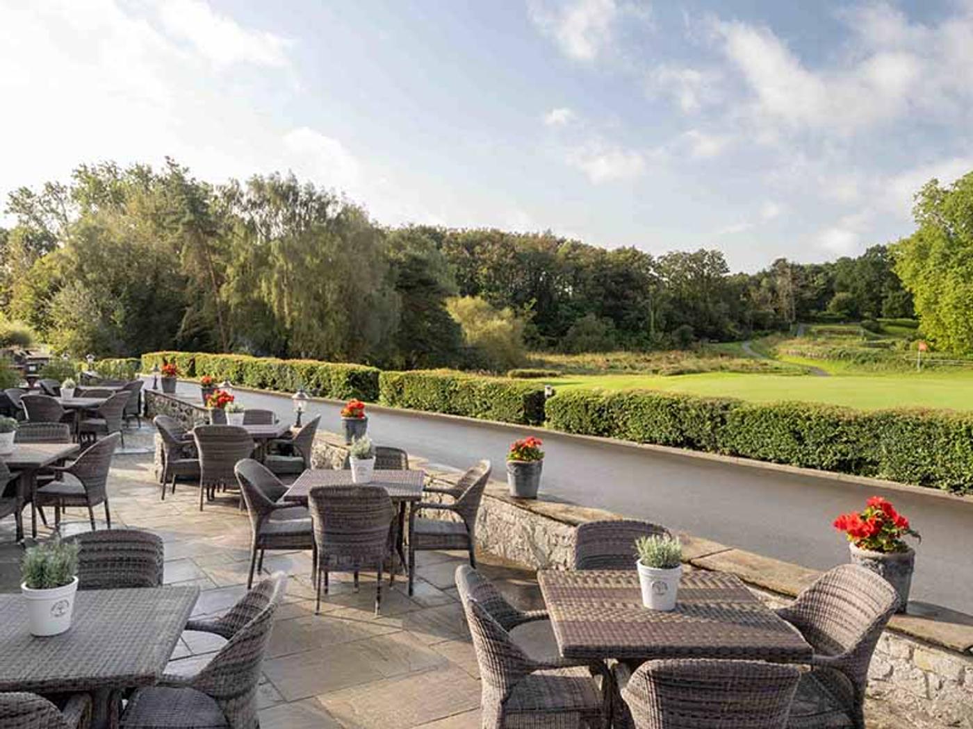 Outdoor patio dining overlooking the golf course