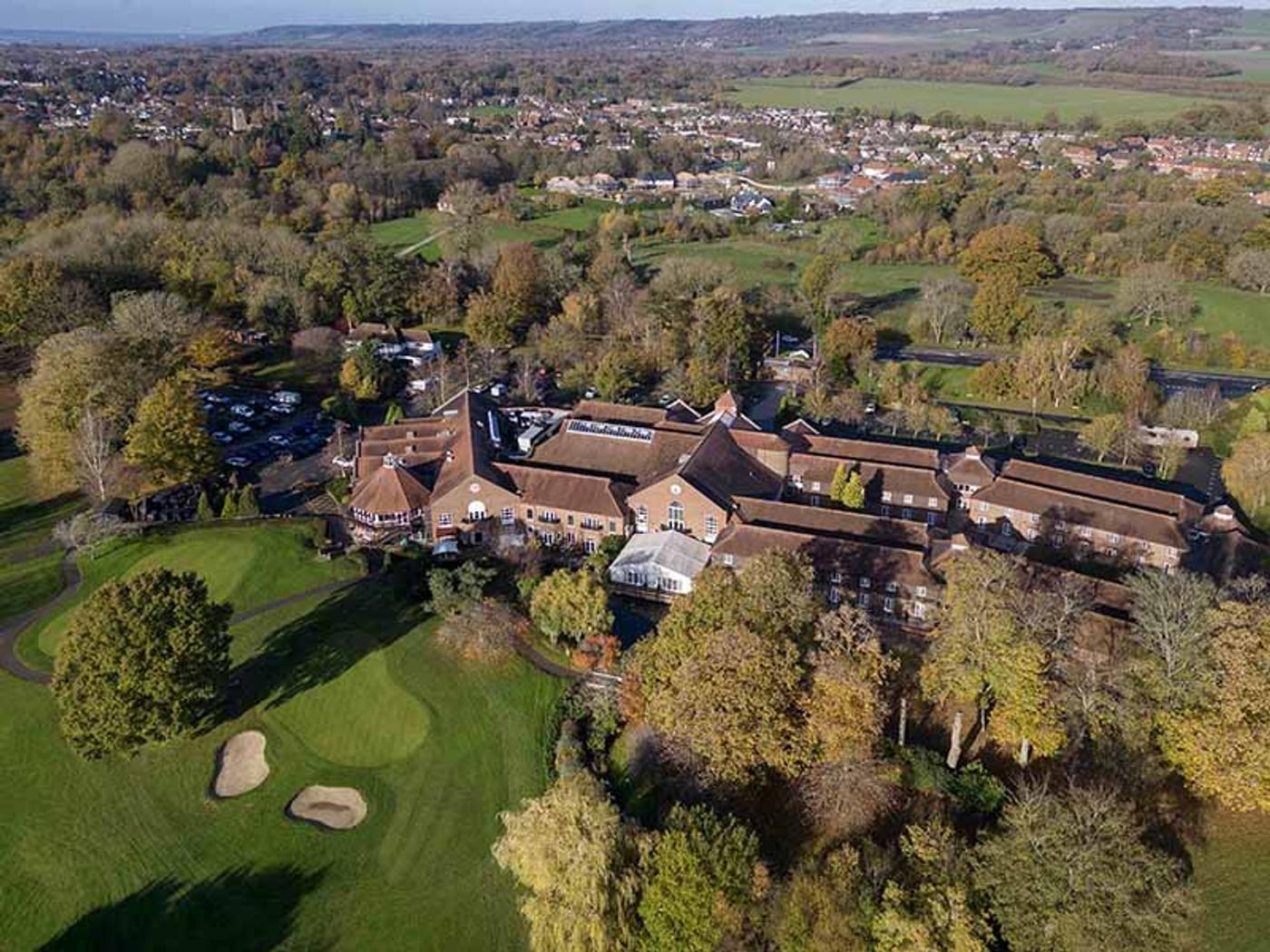 Aerial view of Delta Hotels by Marriott Tudor Park Country Club's clubhouse and golf course
