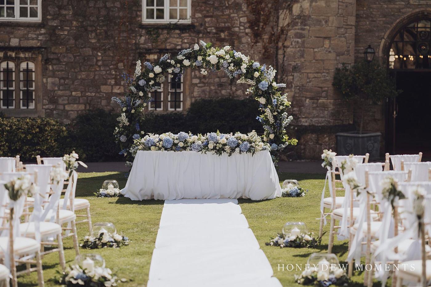 Floral wedding arch outdoors
