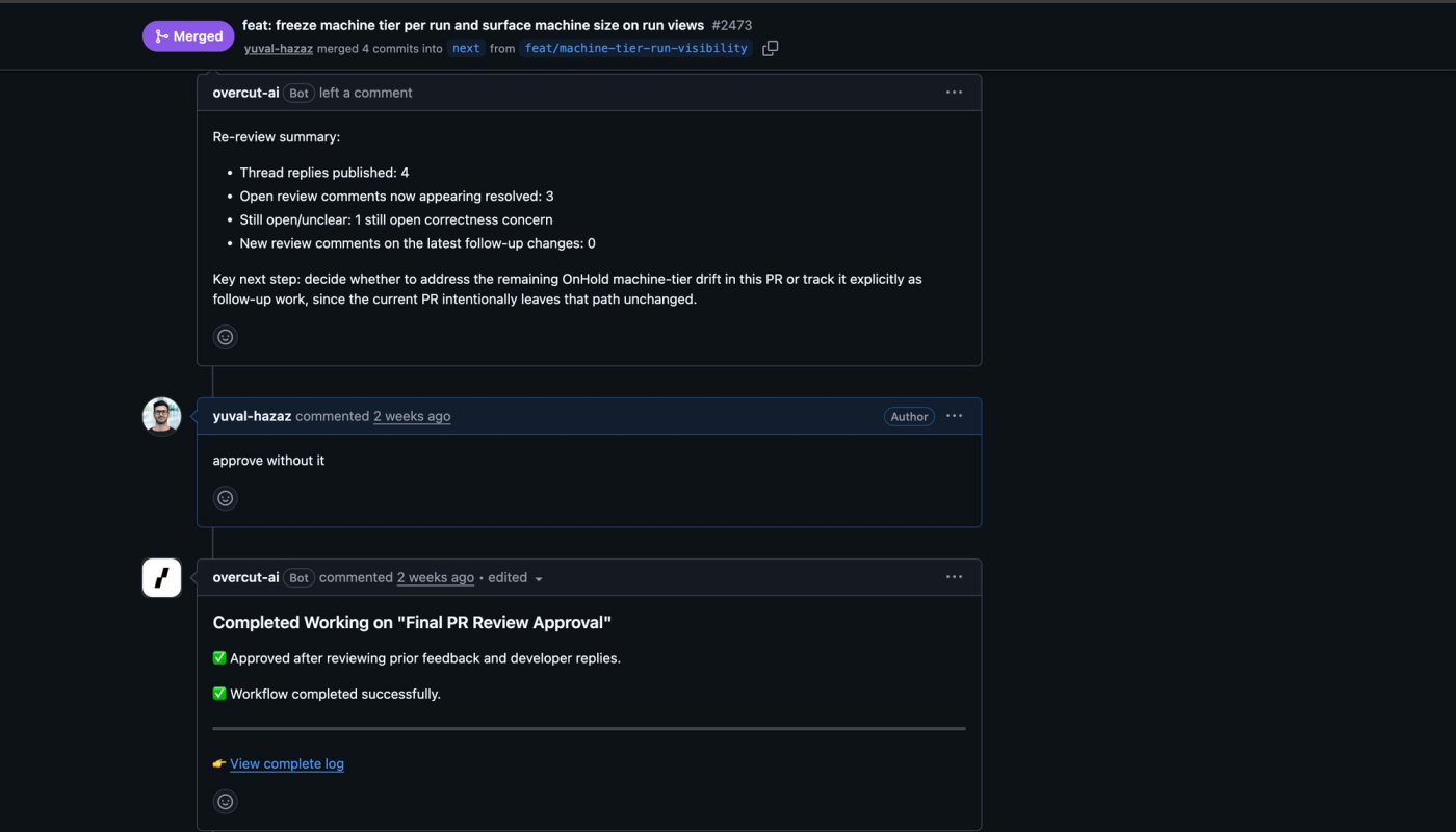 The PR review loop on a merged Overcut pull request: the re-review summary, a one-line human reply, and the final approval carried out