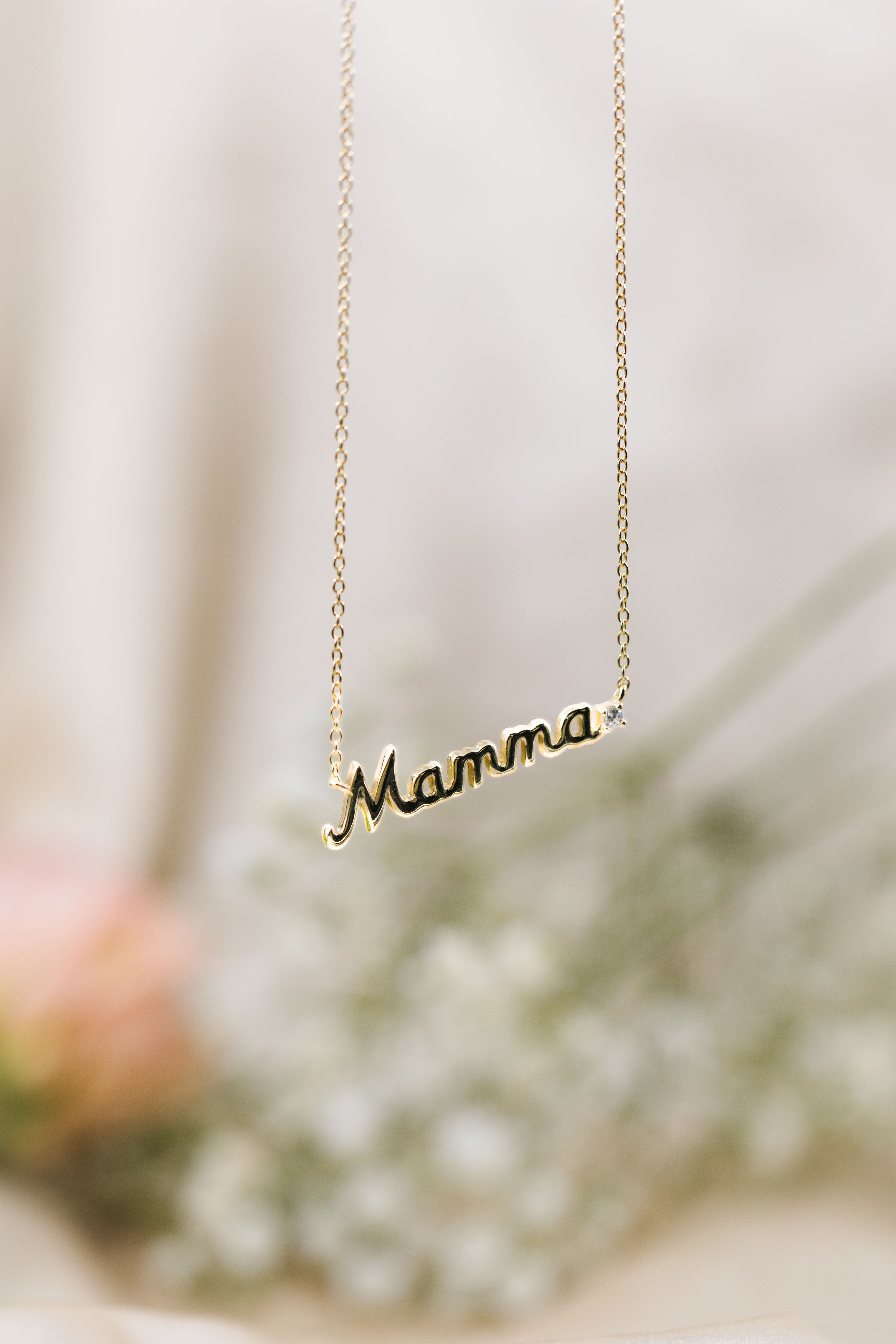 Smykke med teksten mamma