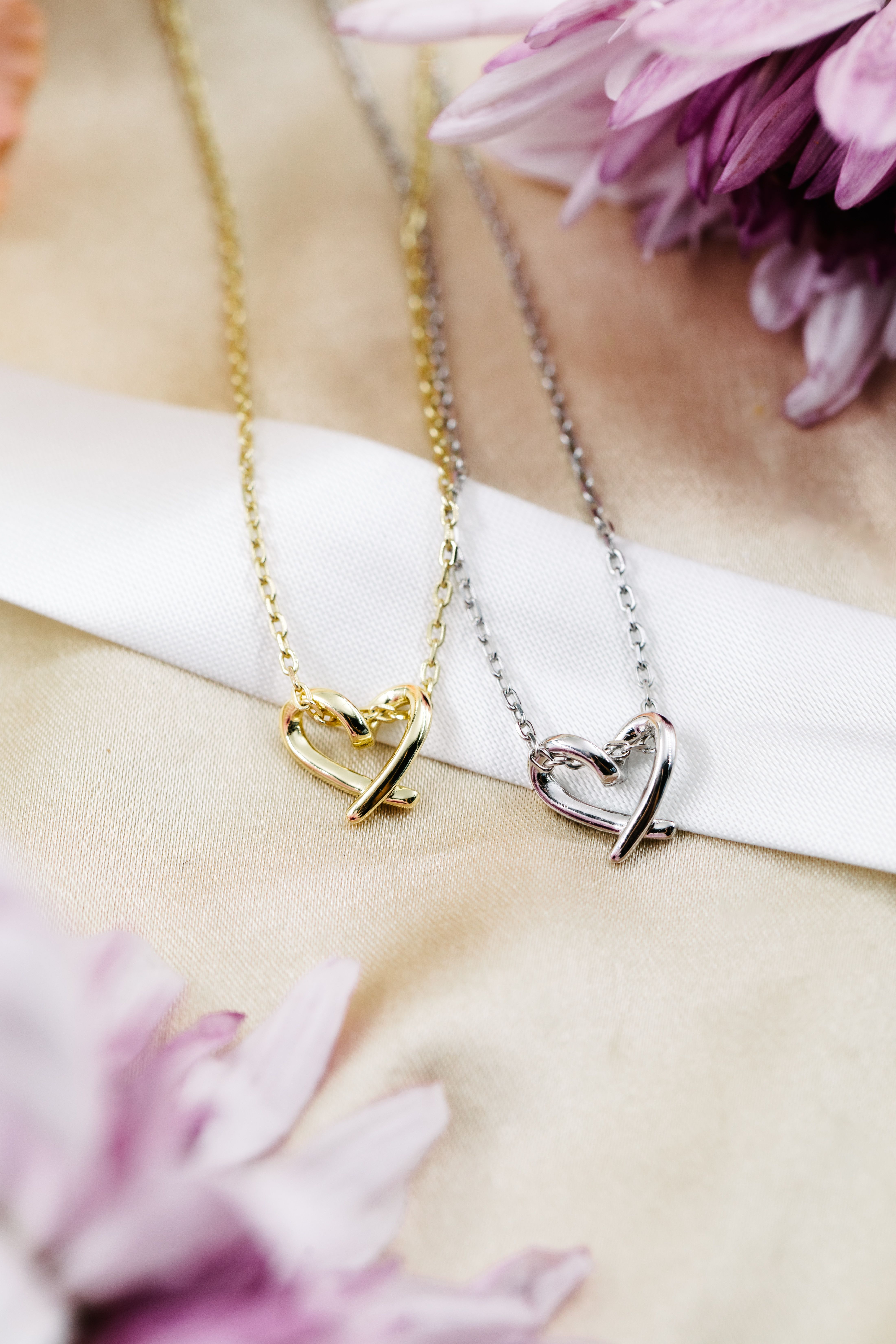 Hjertesmykker i sølv og forgylt sølv