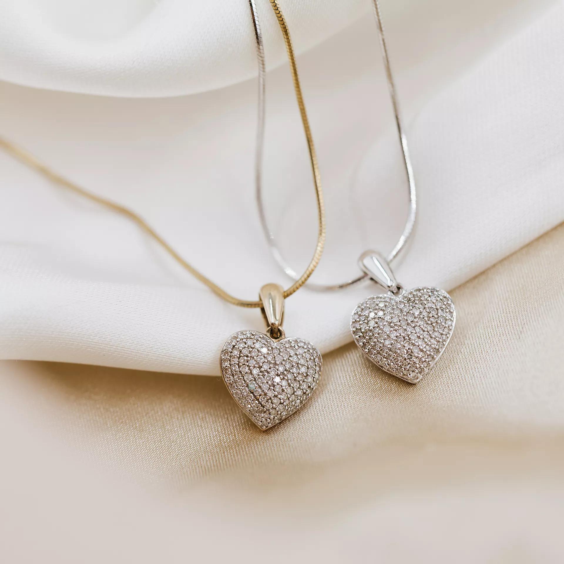 Clara diamantsmykker i gult og hvitt gull