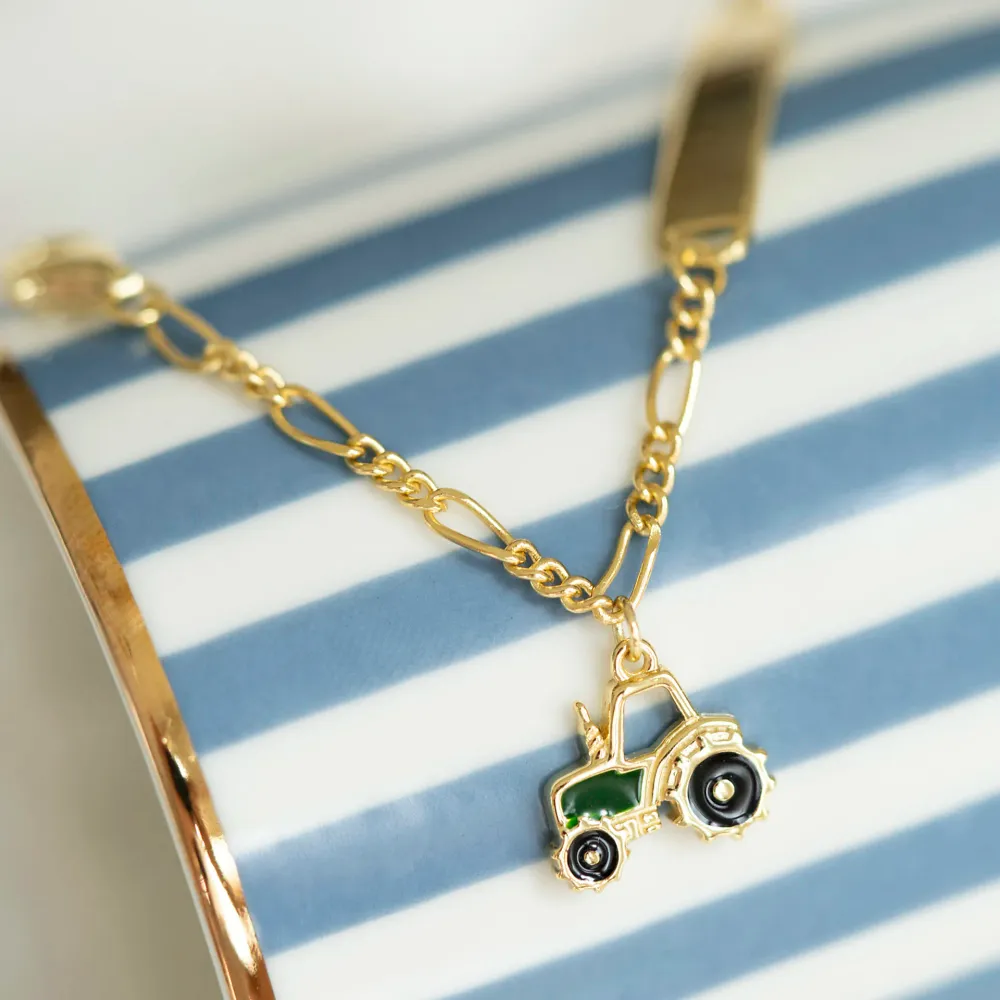 Armbånd i forgylt sølv med traktor og graveringsplate