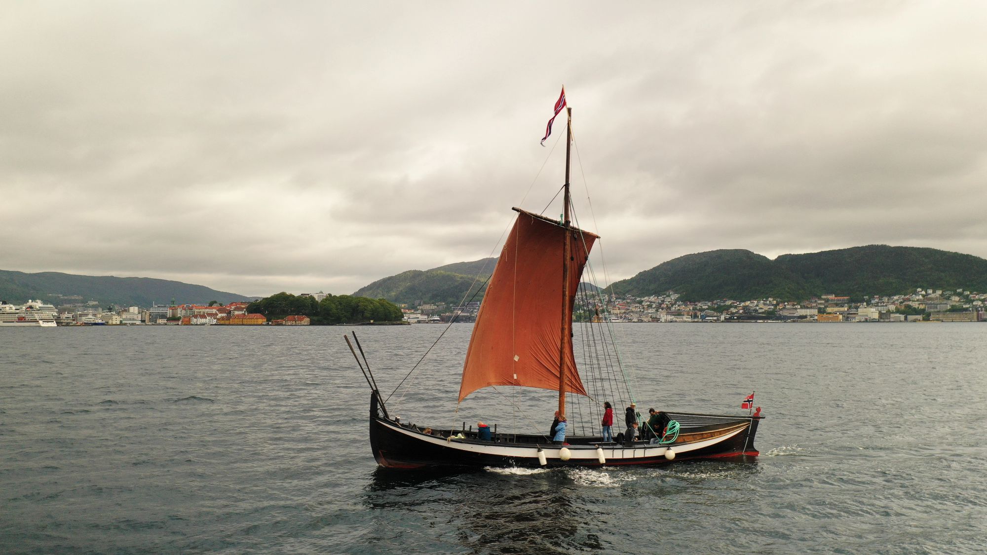 The Viking Voyages ship under square sail on the Bergen fjord