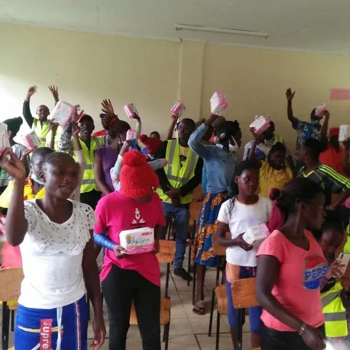 Women receiving sanitary pads