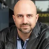 Joseph Tako, Executive Director