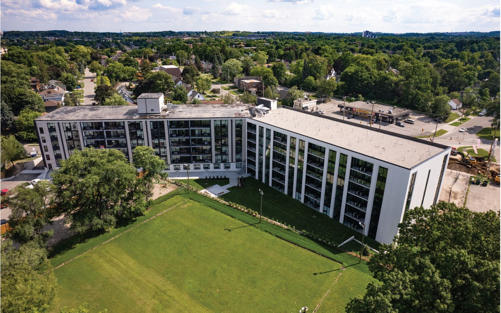 Aerial view of The Woodside Terraces beside a neighbourhood green space in Kitchener.