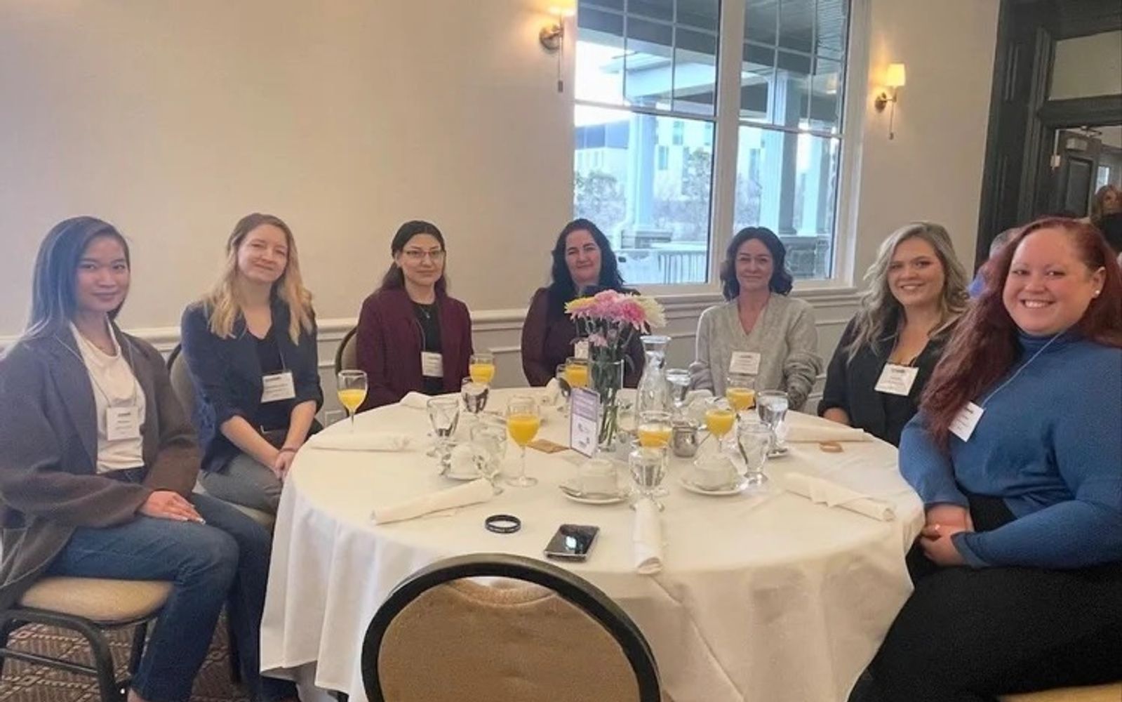 Women of Jackman Ltd. seated together at a 2024 gathering.