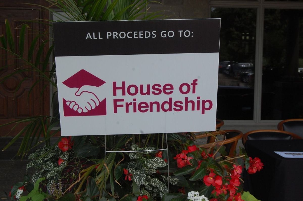 House of Friendship sign at the 4th Annual Jackman Charity Golf Tournament, with all proceeds going to House of Friendship.