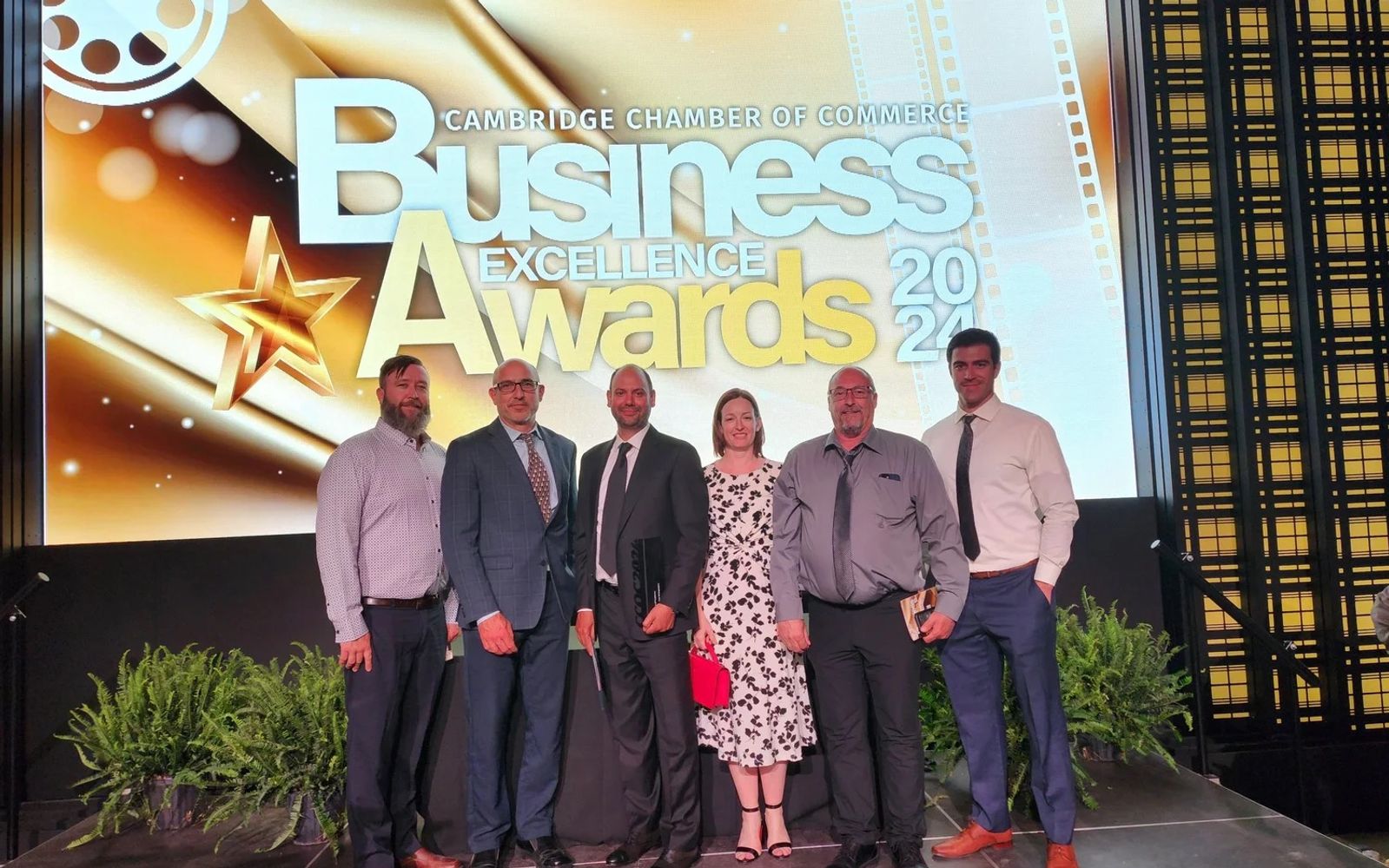 Jackman team on stage at the Cambridge Chamber of Commerce Business Excellence Awards 2024.