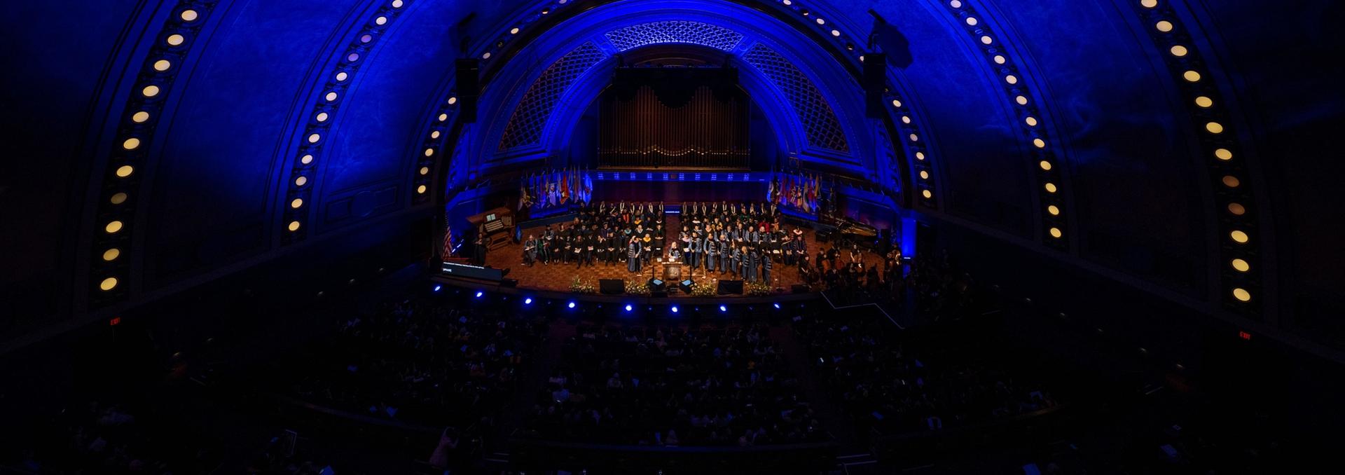 People watching a concert in an auditorium