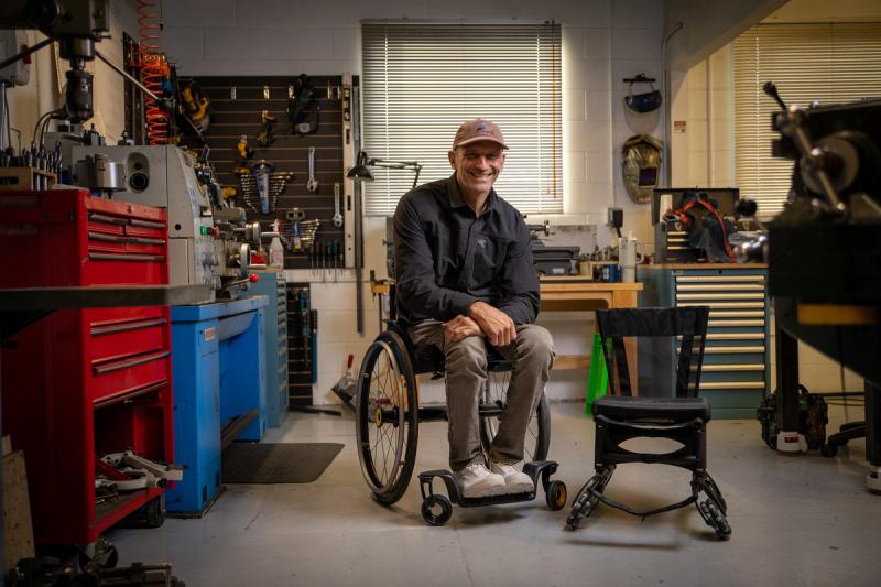 Christian Bagg, founder and chief technology officer of Bowhead Corp, demonstrates the Nano, a collapsible wheelchair that folds to fit inside a backpack, at the companyâs warehouse in Calgary on Tuesday, Oct. 27, 2026.